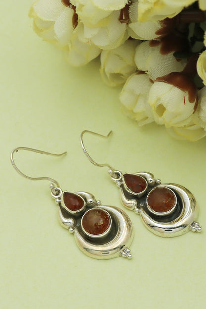White Finish Orange Amber Stone Dangler Earrings In Sterling Silver