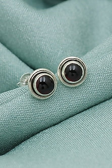 White Finish Garnet Stud Earrings In Sterling Silver