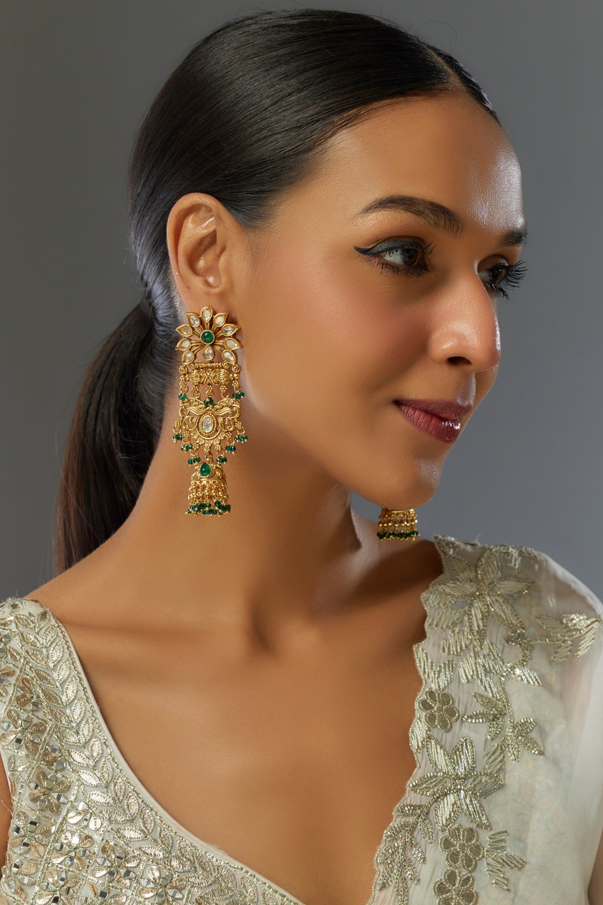 Gold Finish Green Stone & Kundan Polki Jhumka Earrings