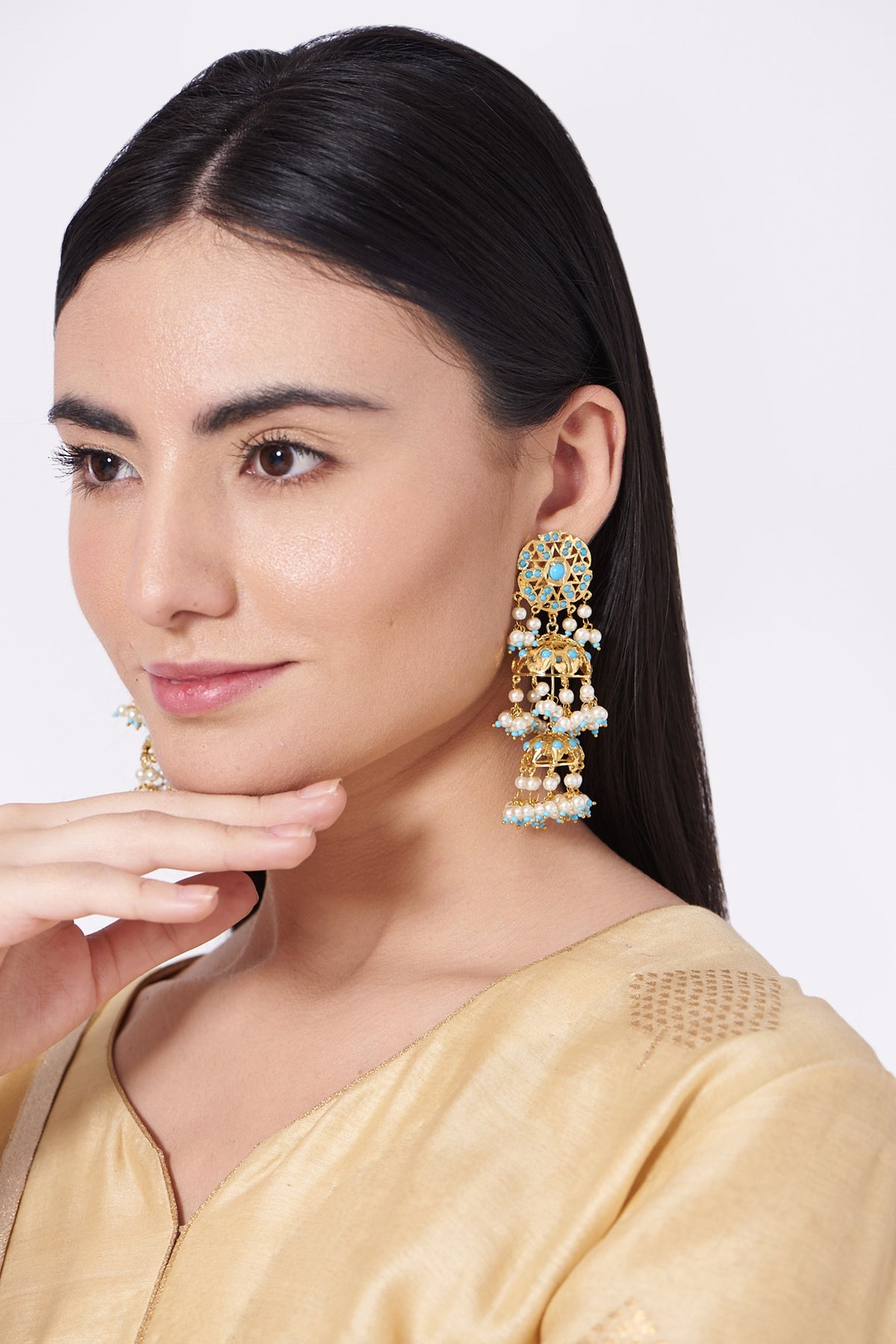 Gold Finish Pearl & Blue Stone Jhumka Earrings