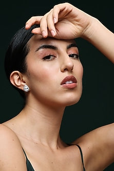 White Finish Zircon Handcrafted Stud Earrings In Sterling Silver