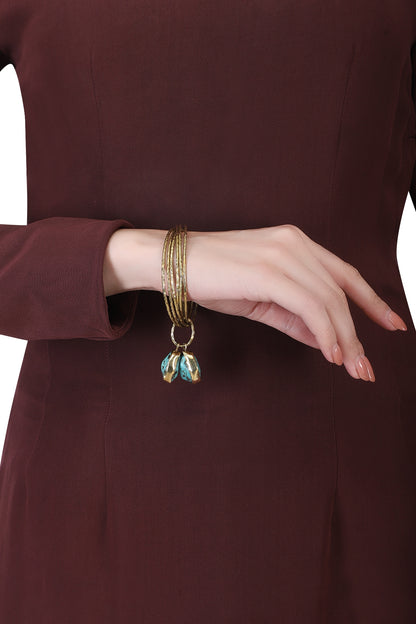 Set of 6 gold plated turquoise stone bangles