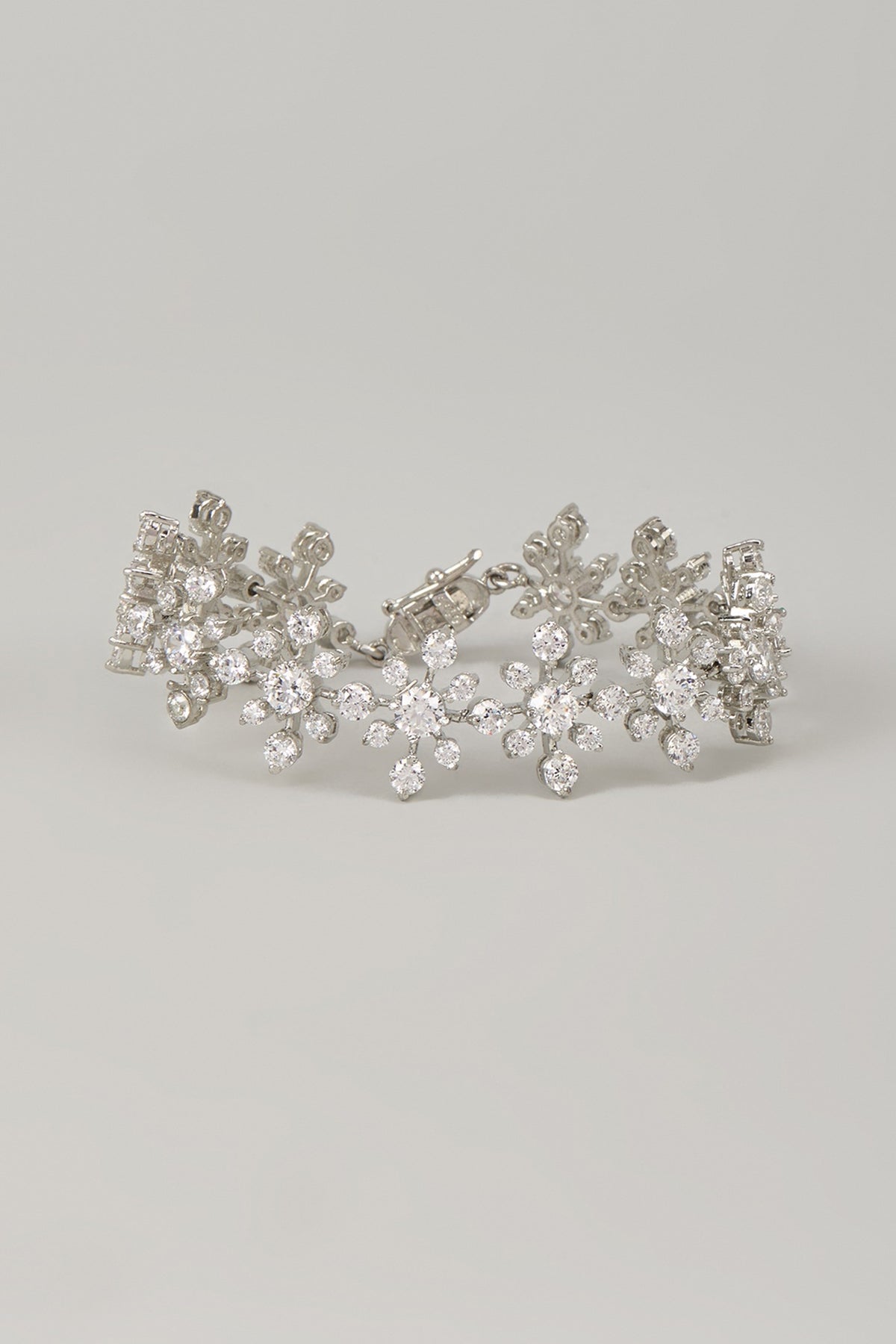 White Rhodium Finish Blue Cubic Zirconia Handcrafted Bracelet In Sterling Silver