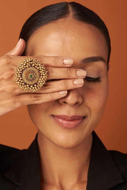 Gold Finish Temple Ring With Golden Beads