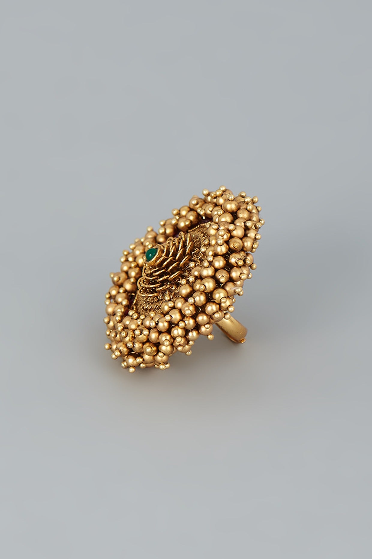 Gold Finish Temple Ring With Golden Beads