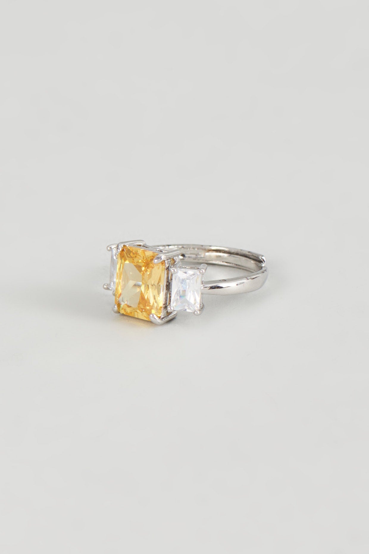 White Finish Zircon & Yellow Stone Ring