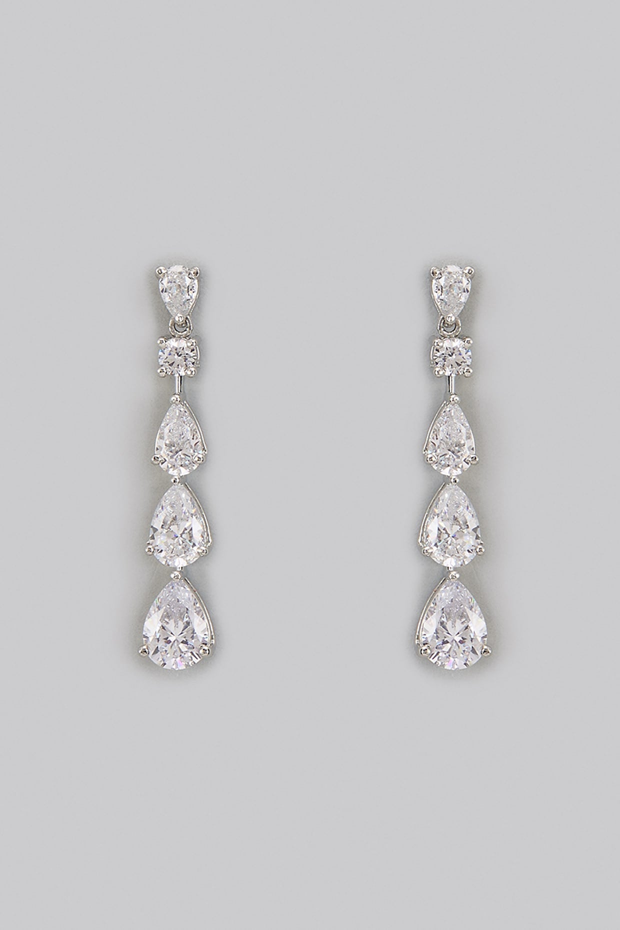 White Rhodium Finish Zircon Dangler Earrings In Sterling Silver