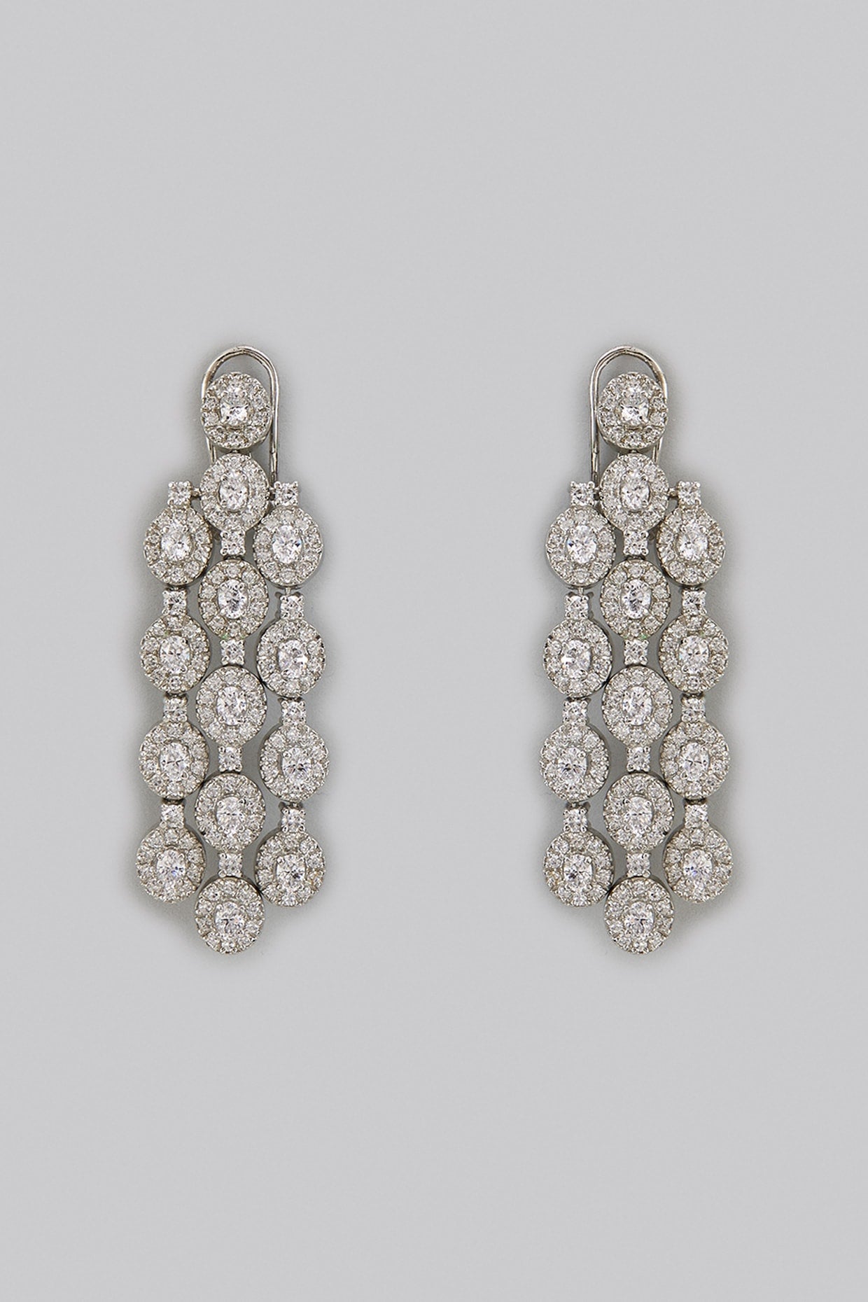 White Rhodium Finish Zircon Dangler Earrings In Sterling Silver