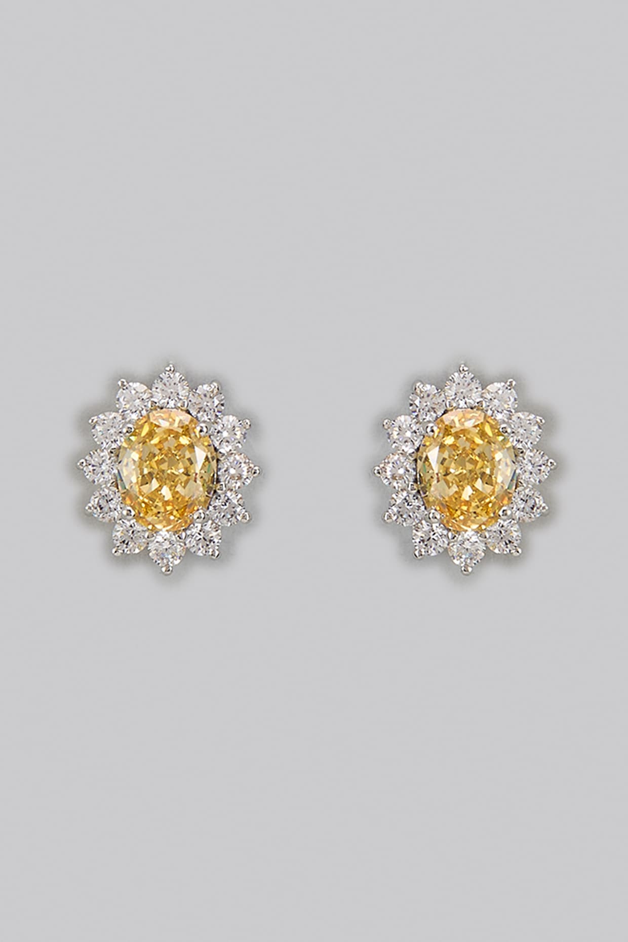 White Rhodium Finish Yellow Sapphire Stone Stud Earrings In Sterling Silver