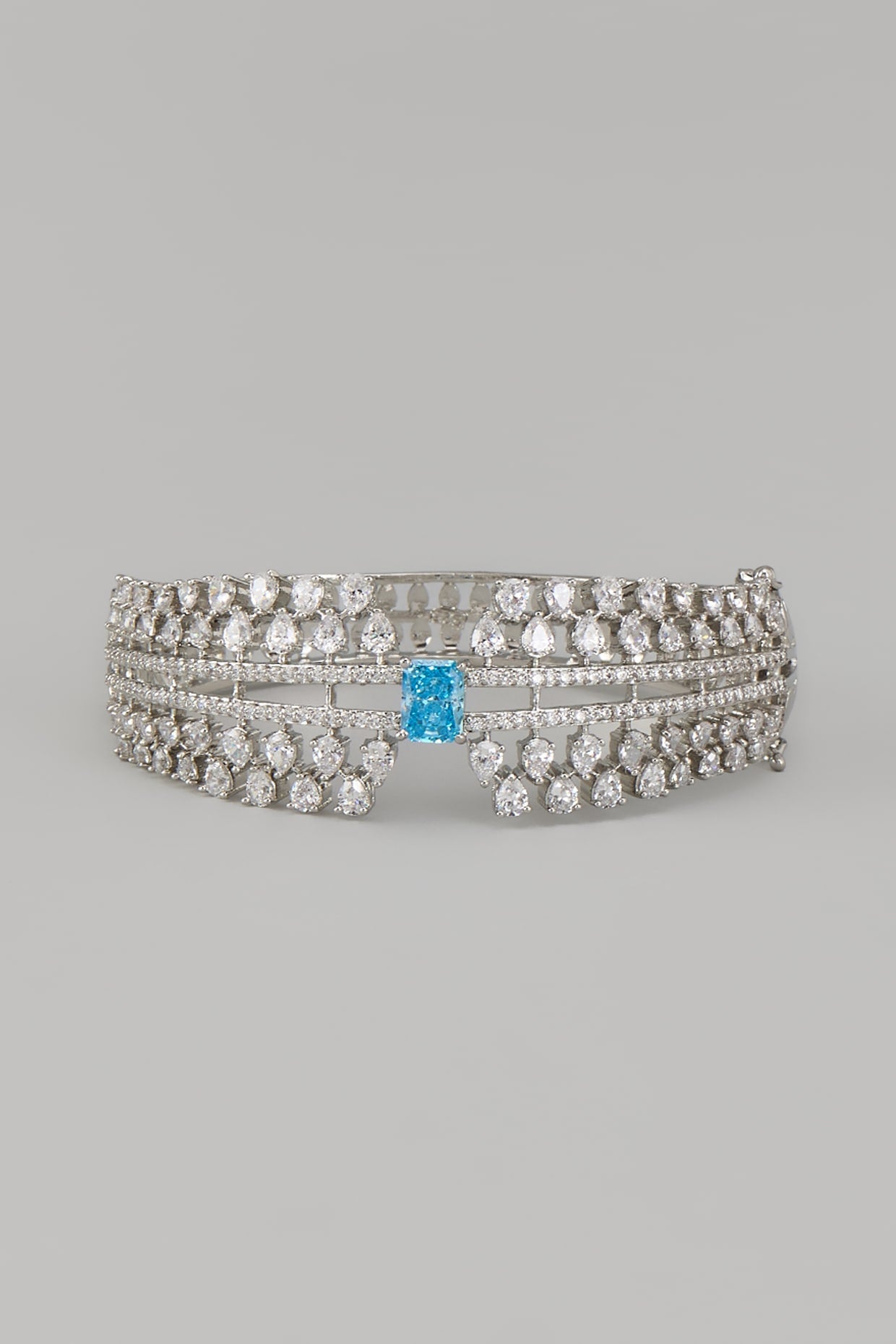 White Rhodium Finish Blue Sapphire Stone Bangle In Sterling Silver