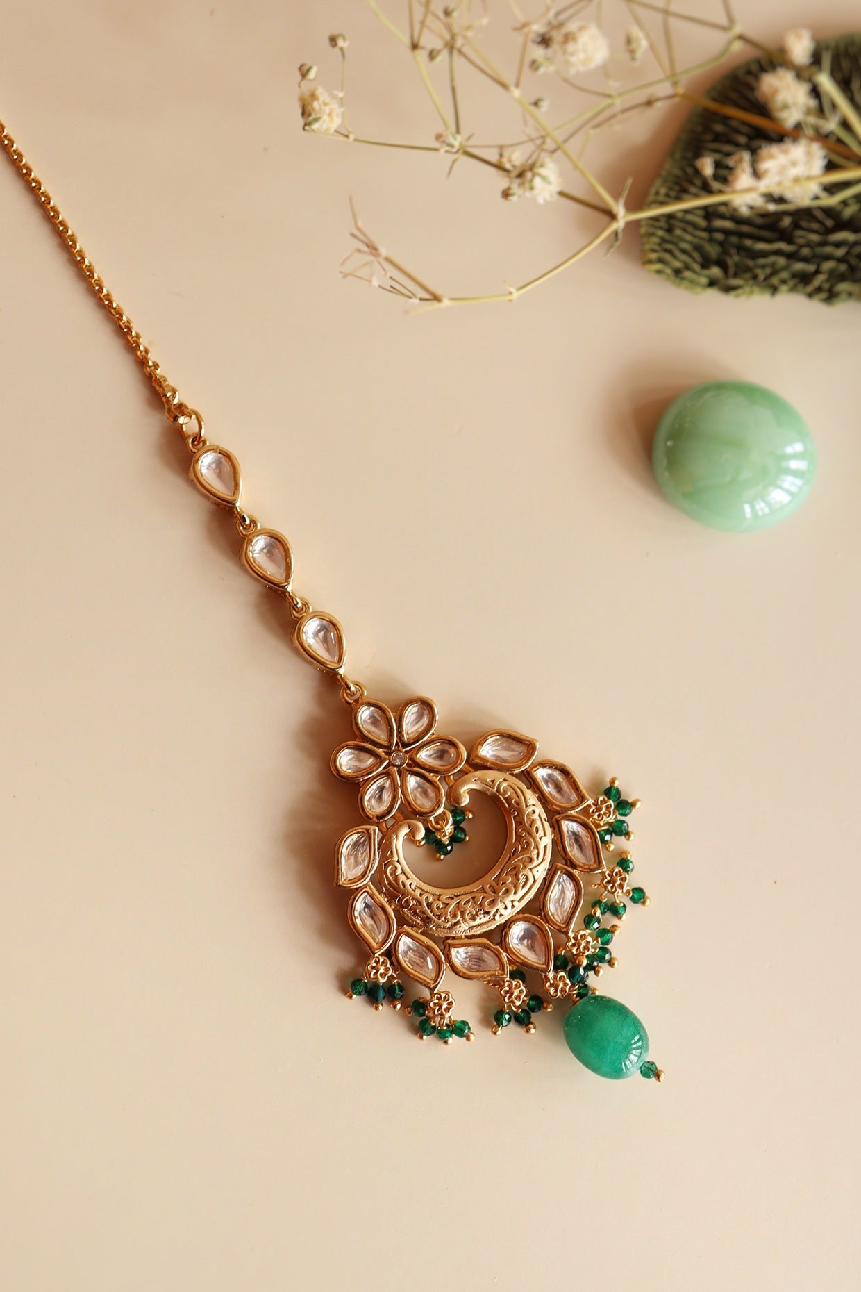 Gold Finish Handcrafted Maang Tikka With Green Stone Drop