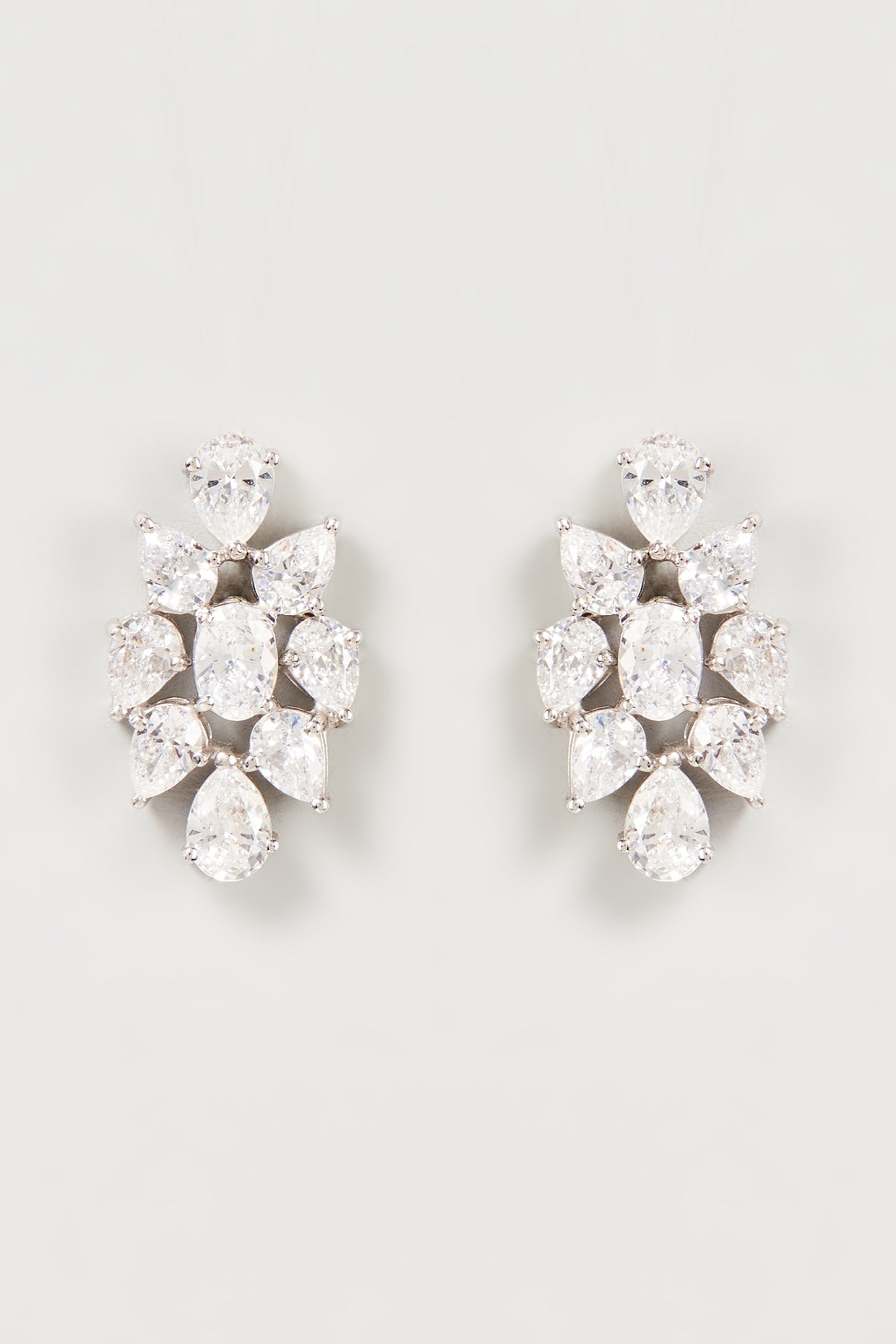 White Finish Swarovski Zirconia Dangler Earrings In Sterling Silver