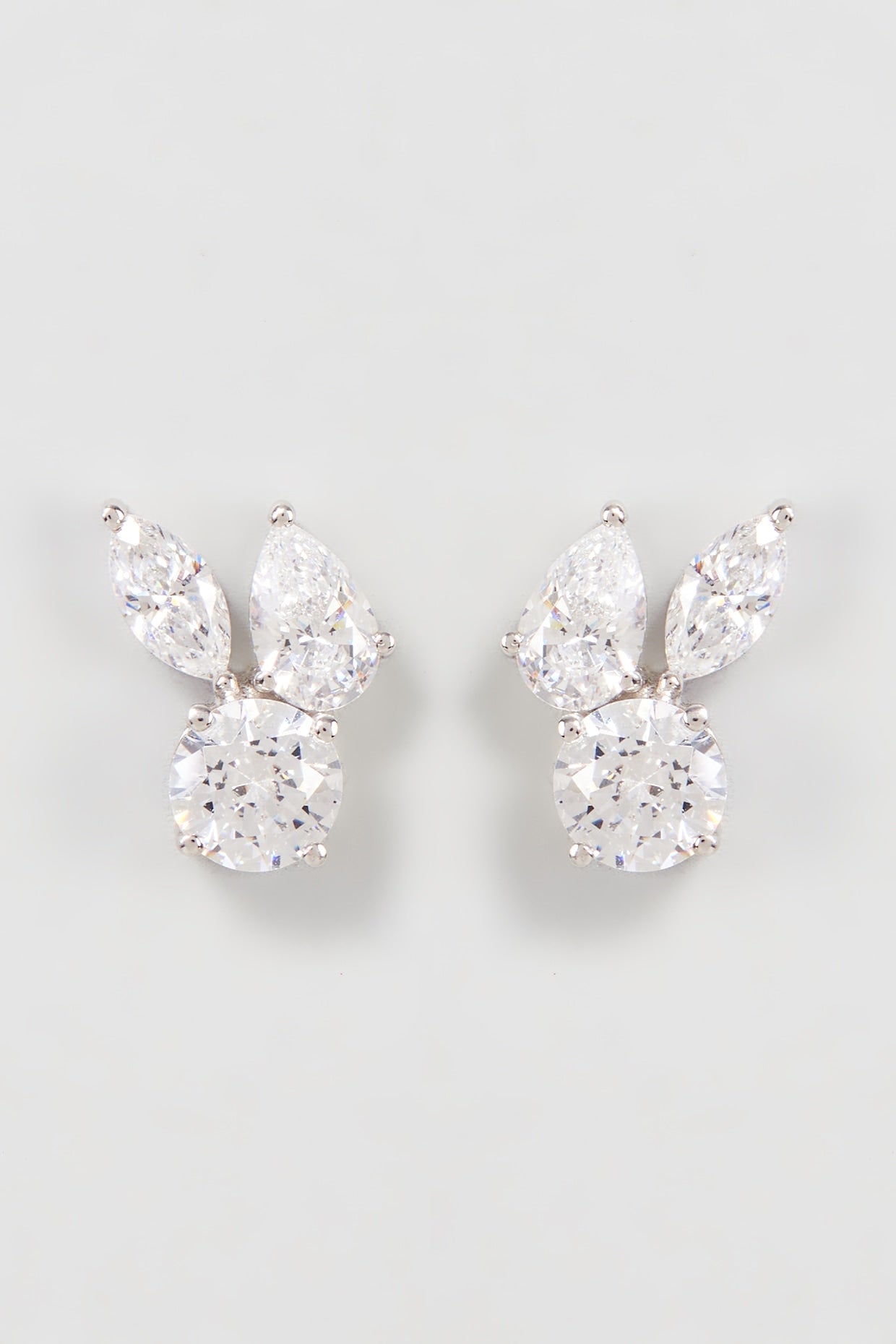 White Finish Swarovski Zirconia Stud Earrings In Sterling Silver