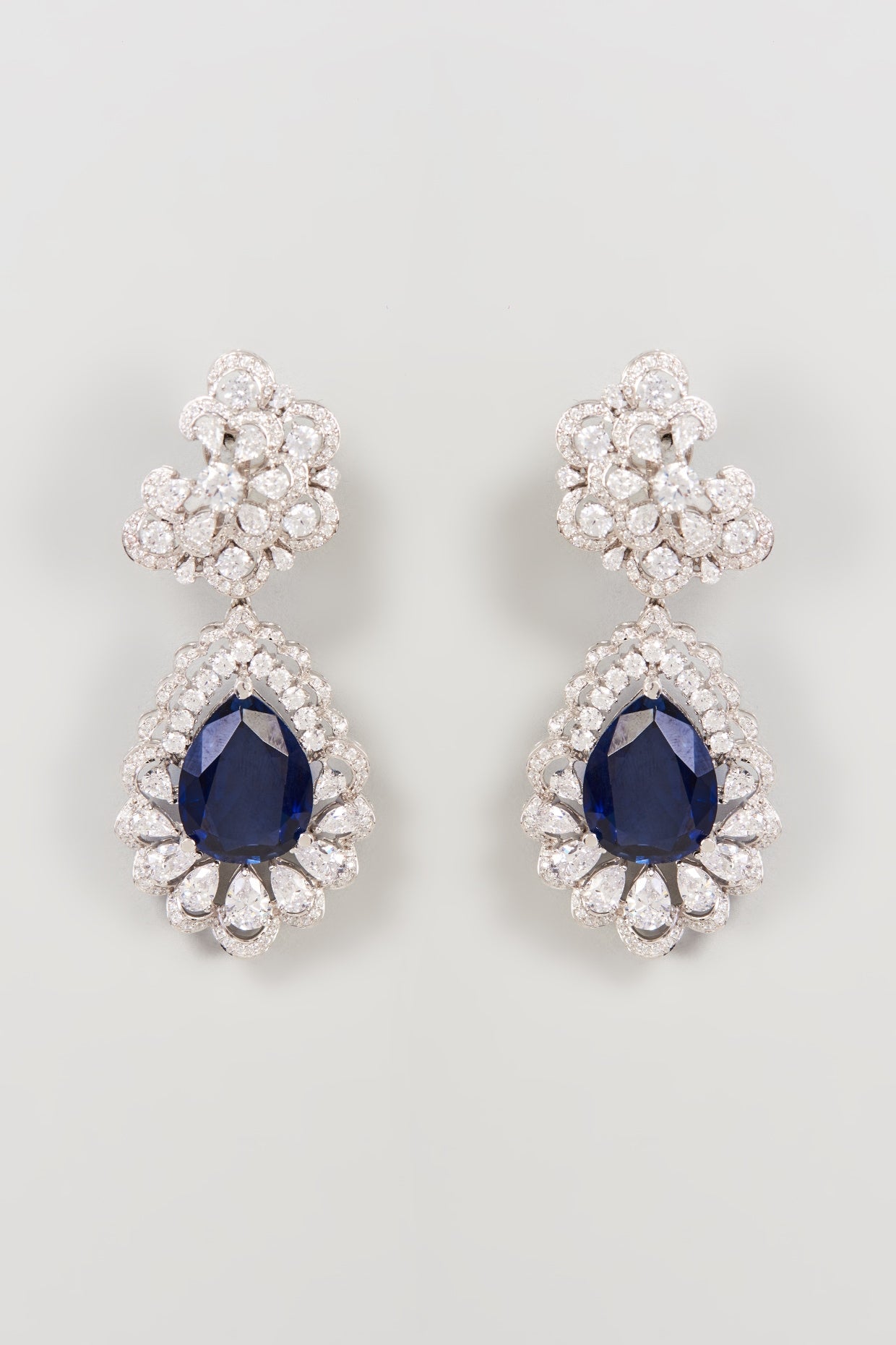 White Finish White & Blue Swarovski Zirconia Dangler Earrings In Sterling Silver