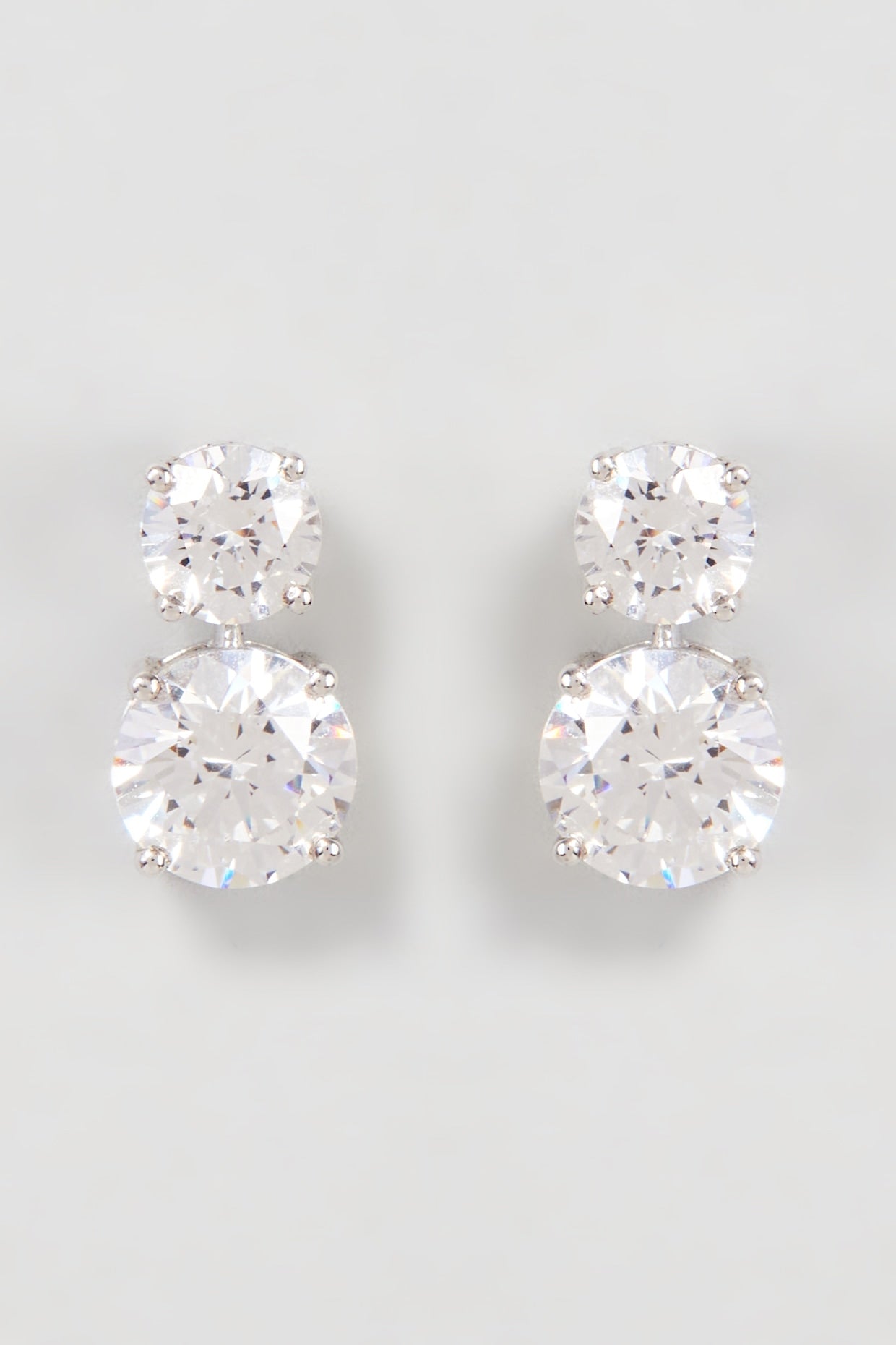 White Finish Swarovski Zirconia Earclip Earrings In Sterling Silver