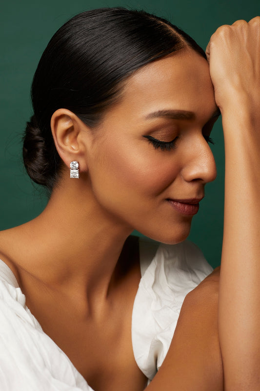 White Finish Swarovski Zirconia Stud Earrings In Sterling Silver