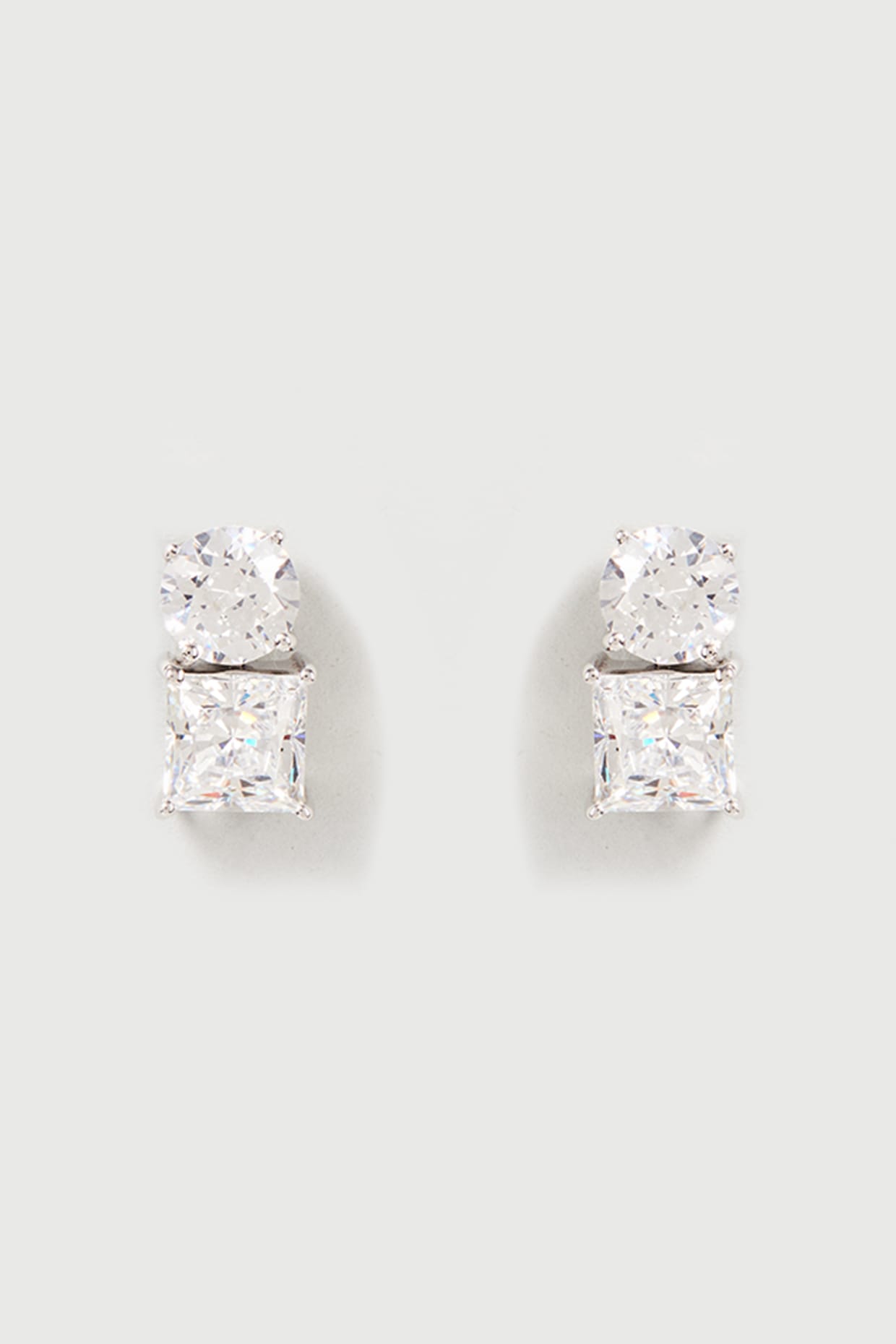 White Finish Swarovski Zirconia Stud Earrings In Sterling Silver