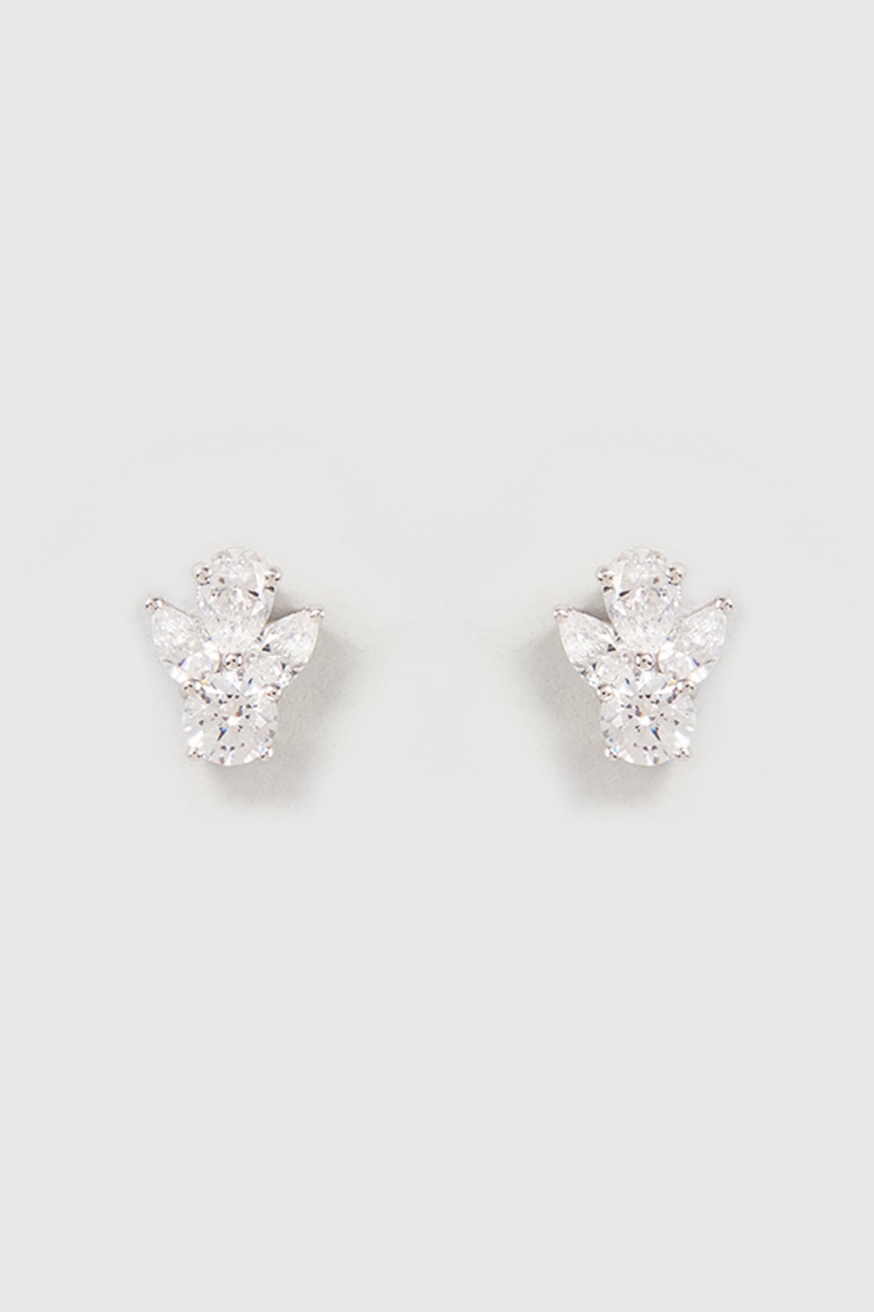 White Finish Swarovski Zirconia Stud Earrings In Sterling Silver