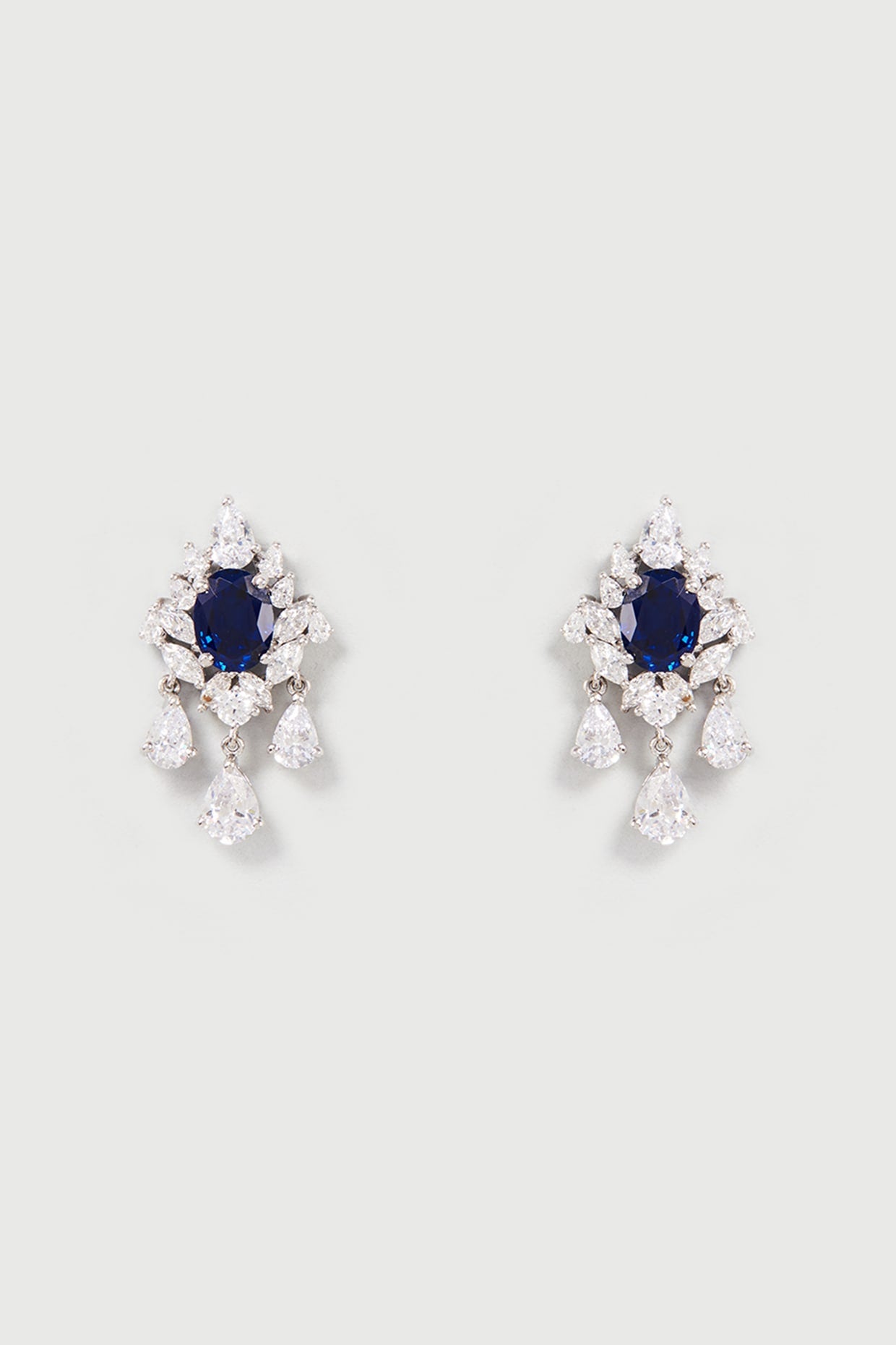 White Finish White & Blue Swarovski Zirconia Dangler Earrings In Sterling Silver