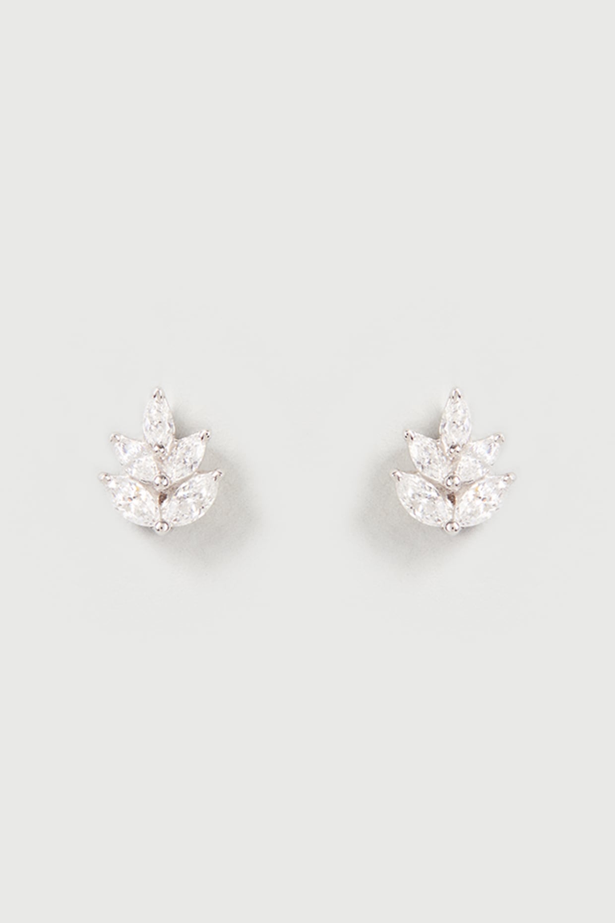 White Finish Swarovski Zirconia Stud Earrings In Sterling Silver