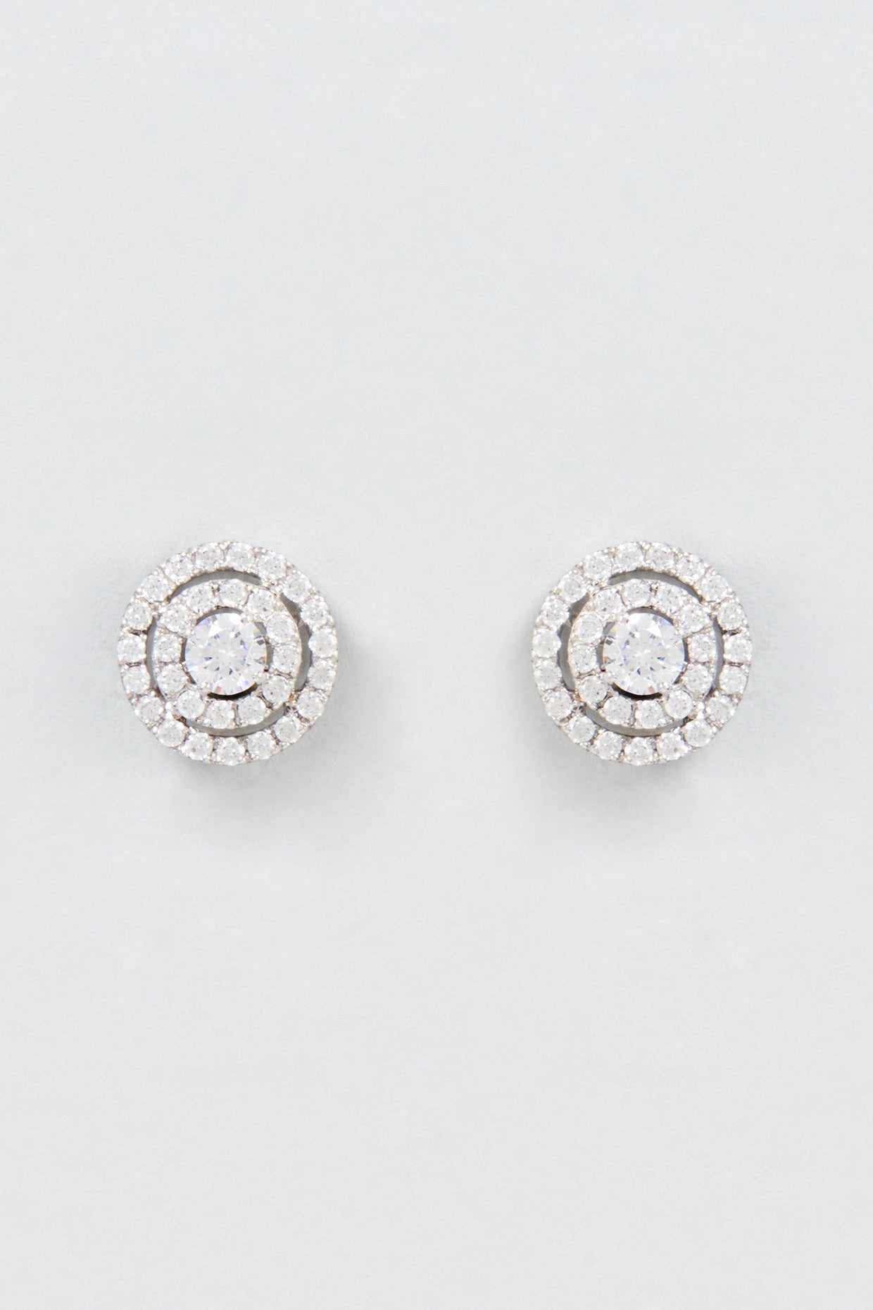 White Finish Oval Cut Swarovski Zirconia Stud Earrings In Sterling Silver