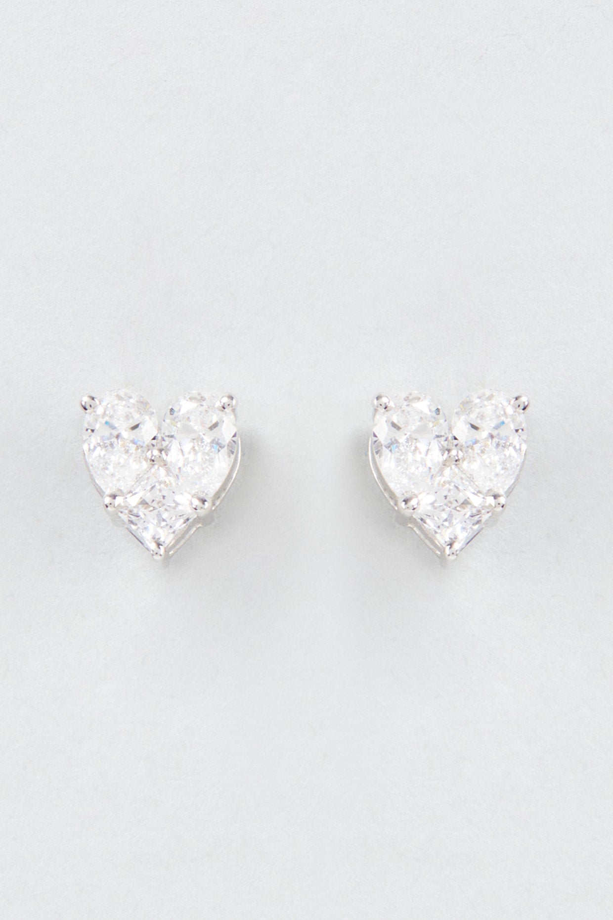 White Finish Swarovski Zirconia Stud Earrings In Sterling Silver