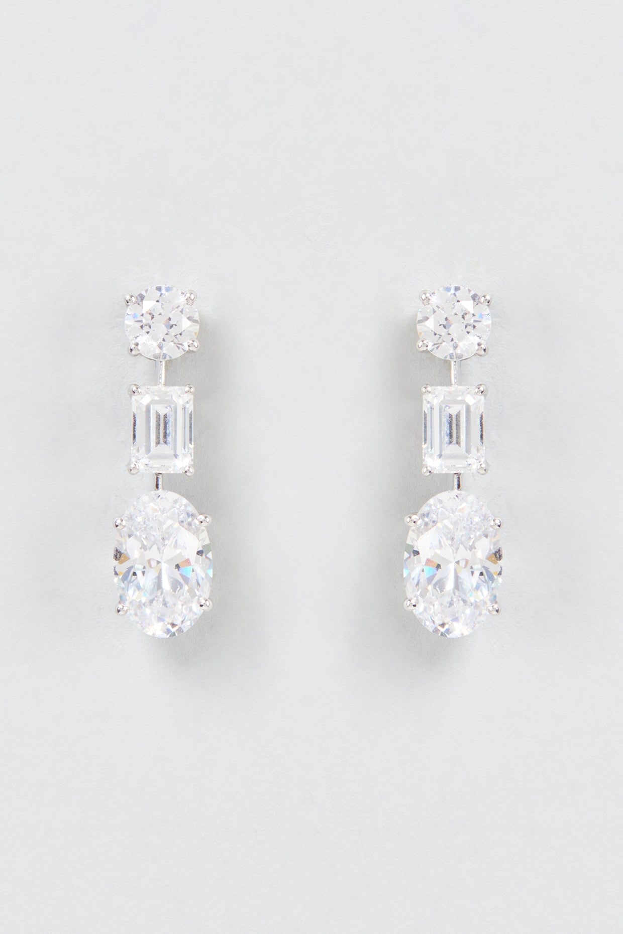 White Finish Swarovski Zirconia Dangler Earrings In Sterling Silver