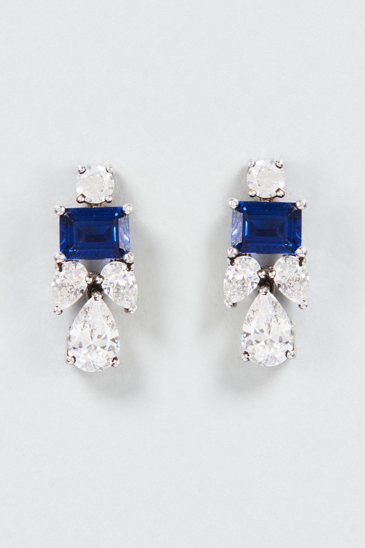 White Finish White & Blue Emerald Cut Swarovski Zirconia Dangler Earrings In Sterling Silver