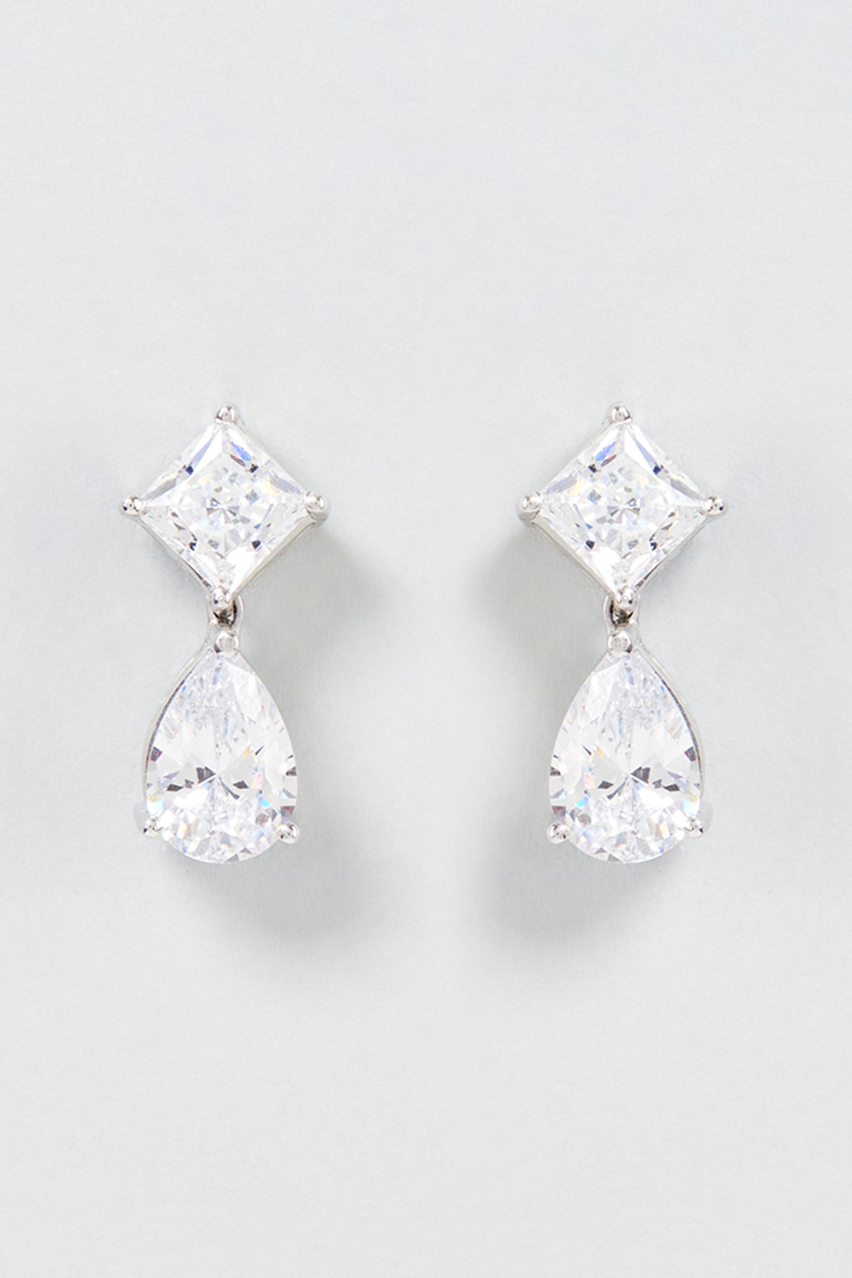 White Finish Swarovski Zirconia Dangler Earrings In Sterling Silver