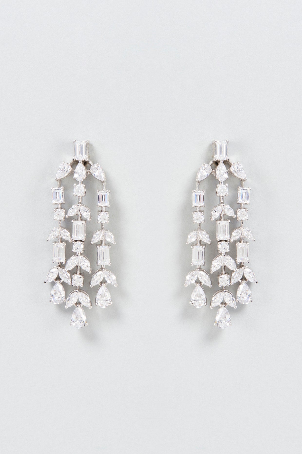 White Finish Swarovski Zirconia Dangler Earrings In Sterling Silver