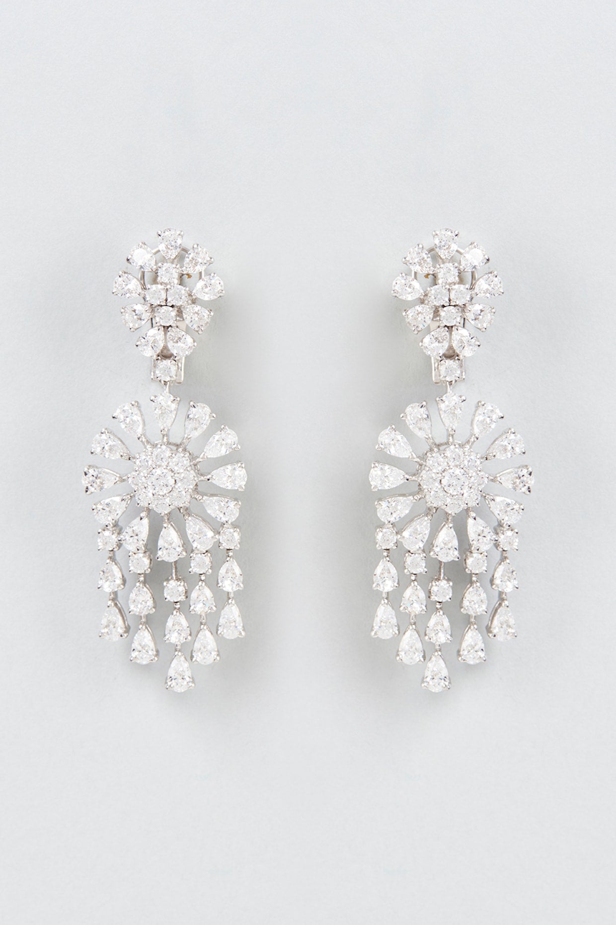 White Finish Swarovski Zirconia Dangler Earrings In Sterling Silver