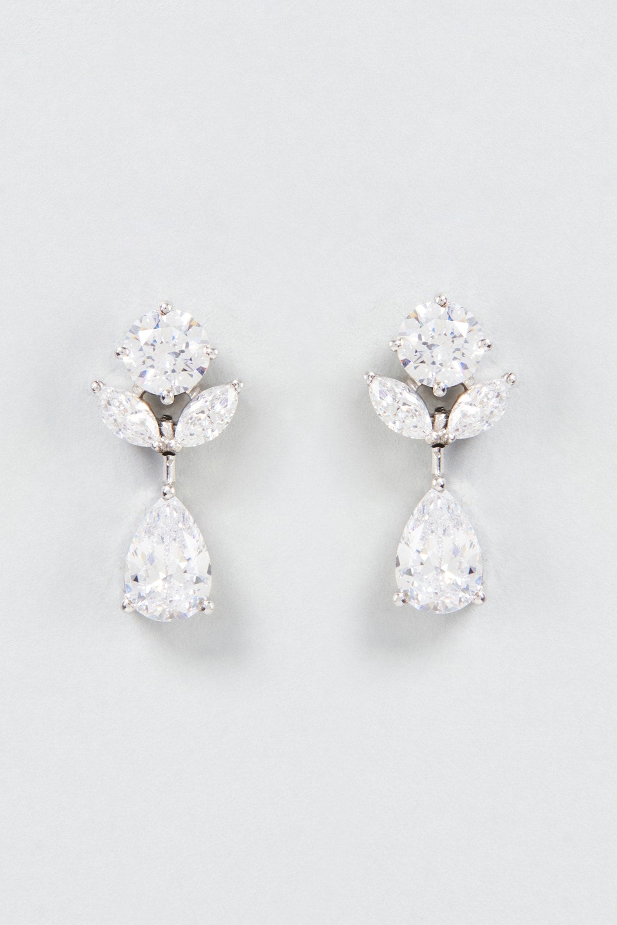 White Finish Swarovski Zirconia Drop Earrings In Sterling Silver