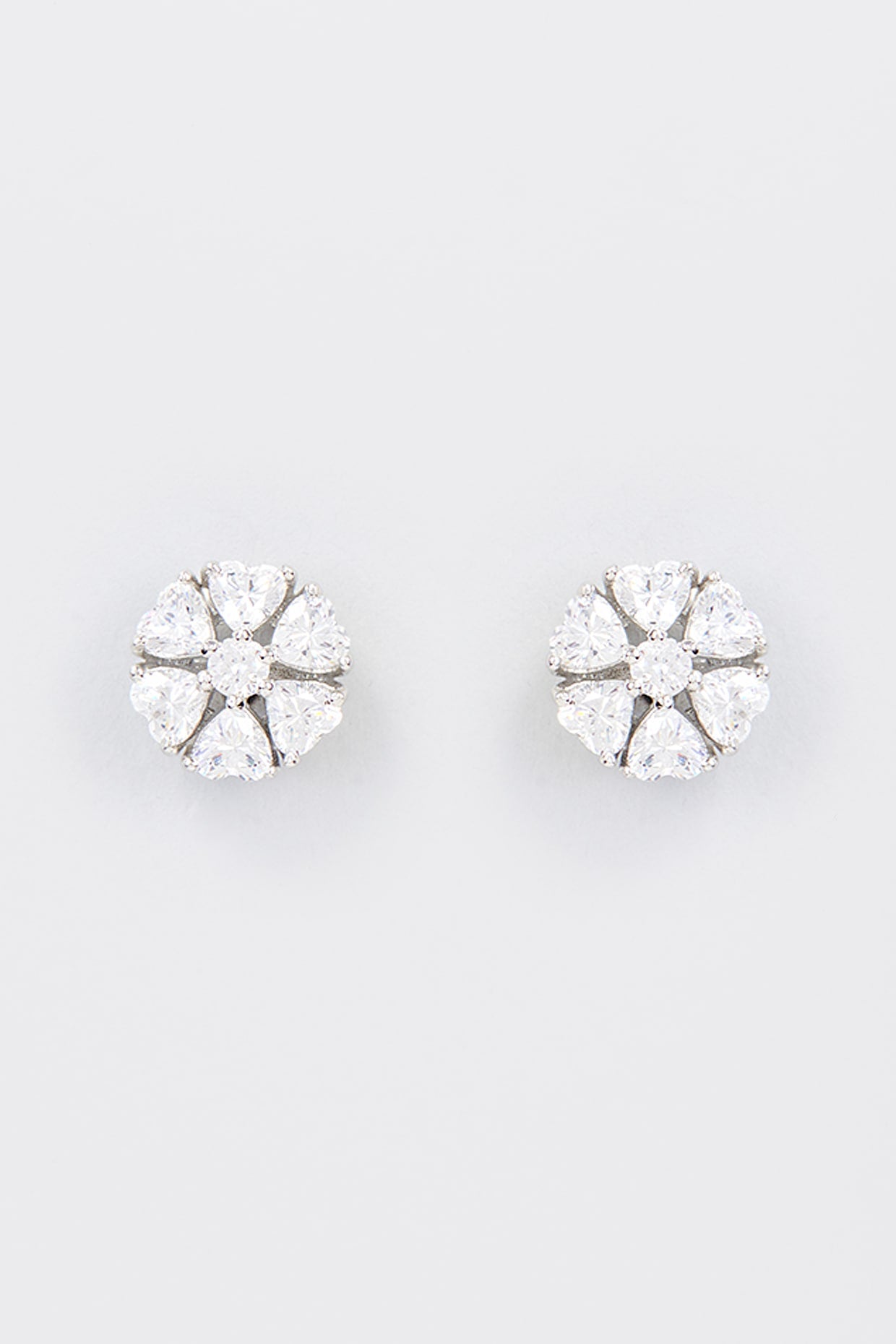 White Finish Zircon Stud Earrings In Sterling Silver