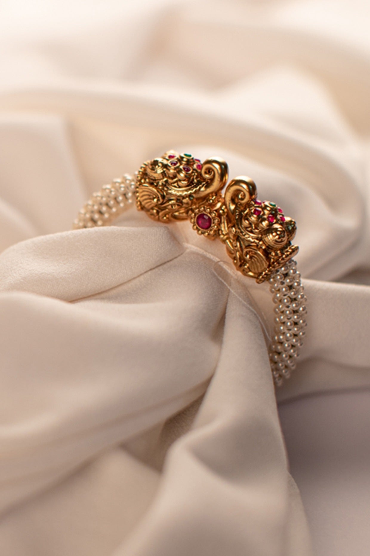 Gold Finish Bangle With Red Stones