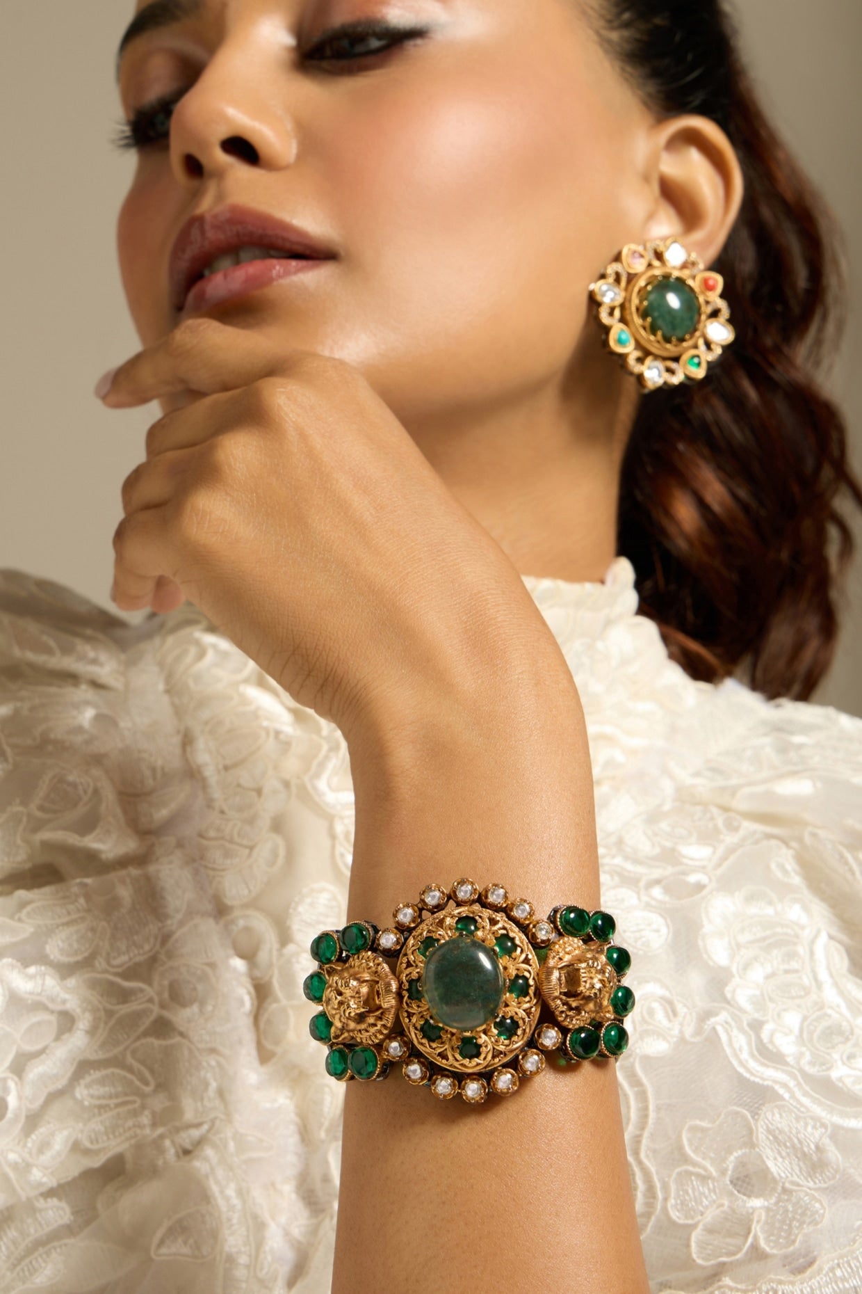 Gold Finish Motifs & Green Stone Bracelet