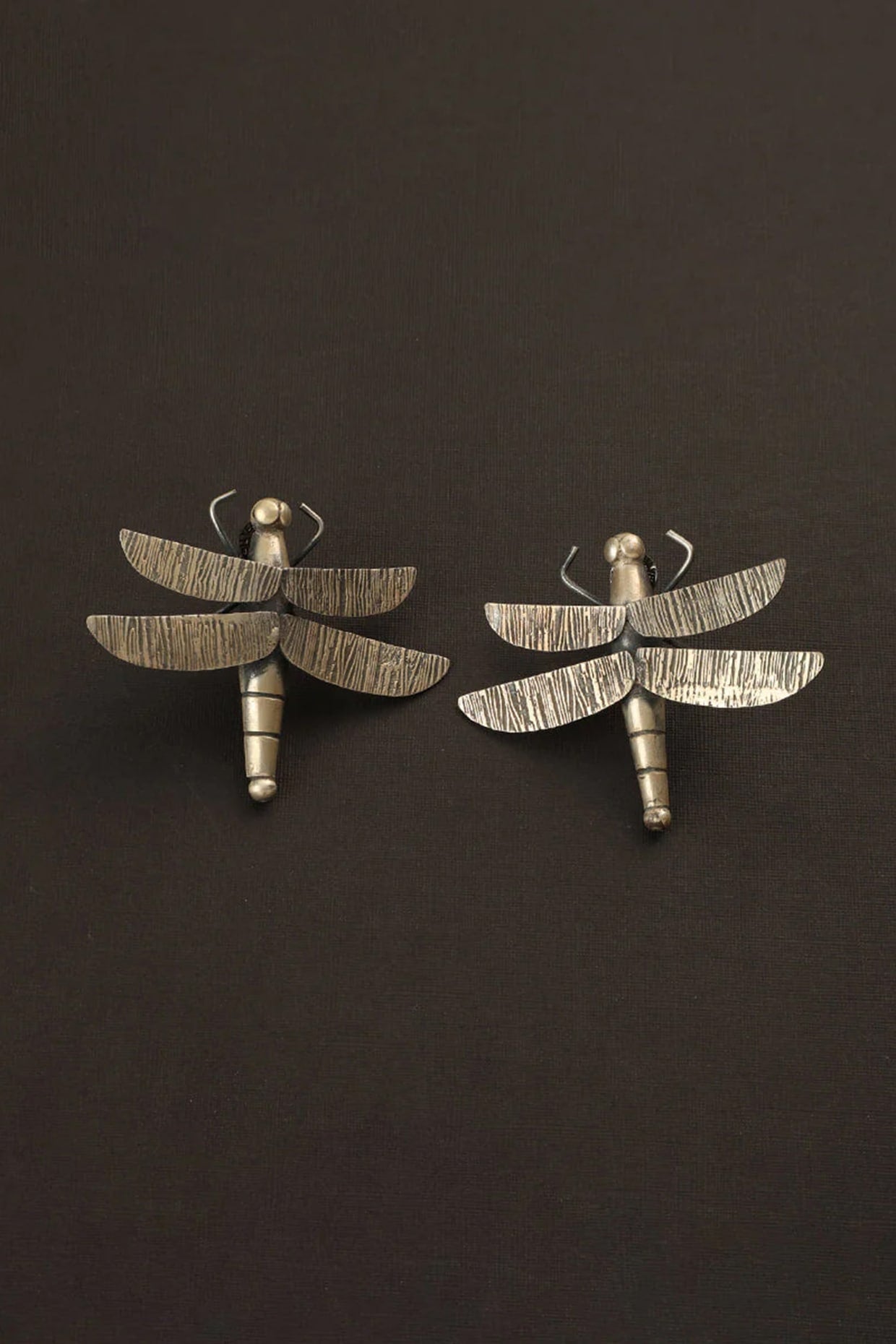 White Finish Fly Dangler Earrings In Sterling Silver