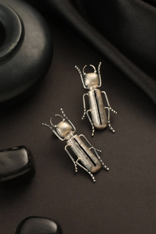 White Finish Bug Dangler Earrings In Sterling Silver