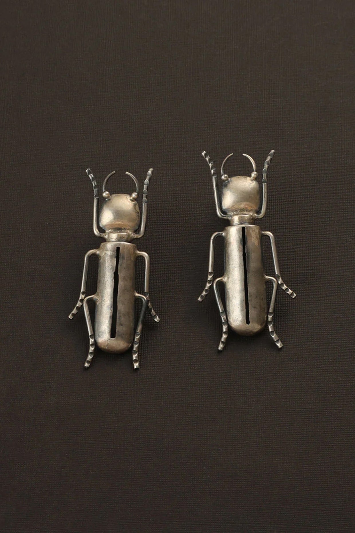 White Finish Bug Dangler Earrings In Sterling Silver