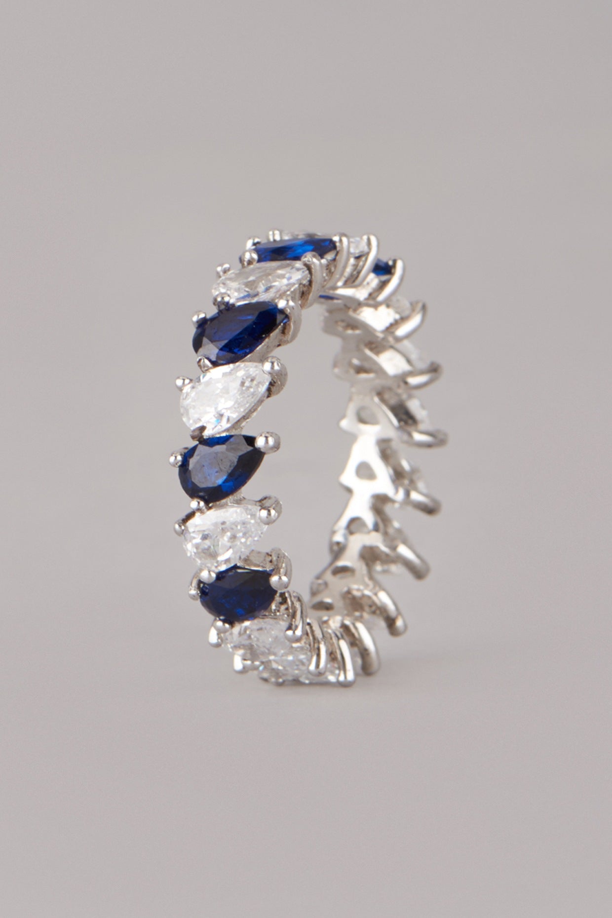 White Finish Blue Sapphire Ring In Sterling Silver