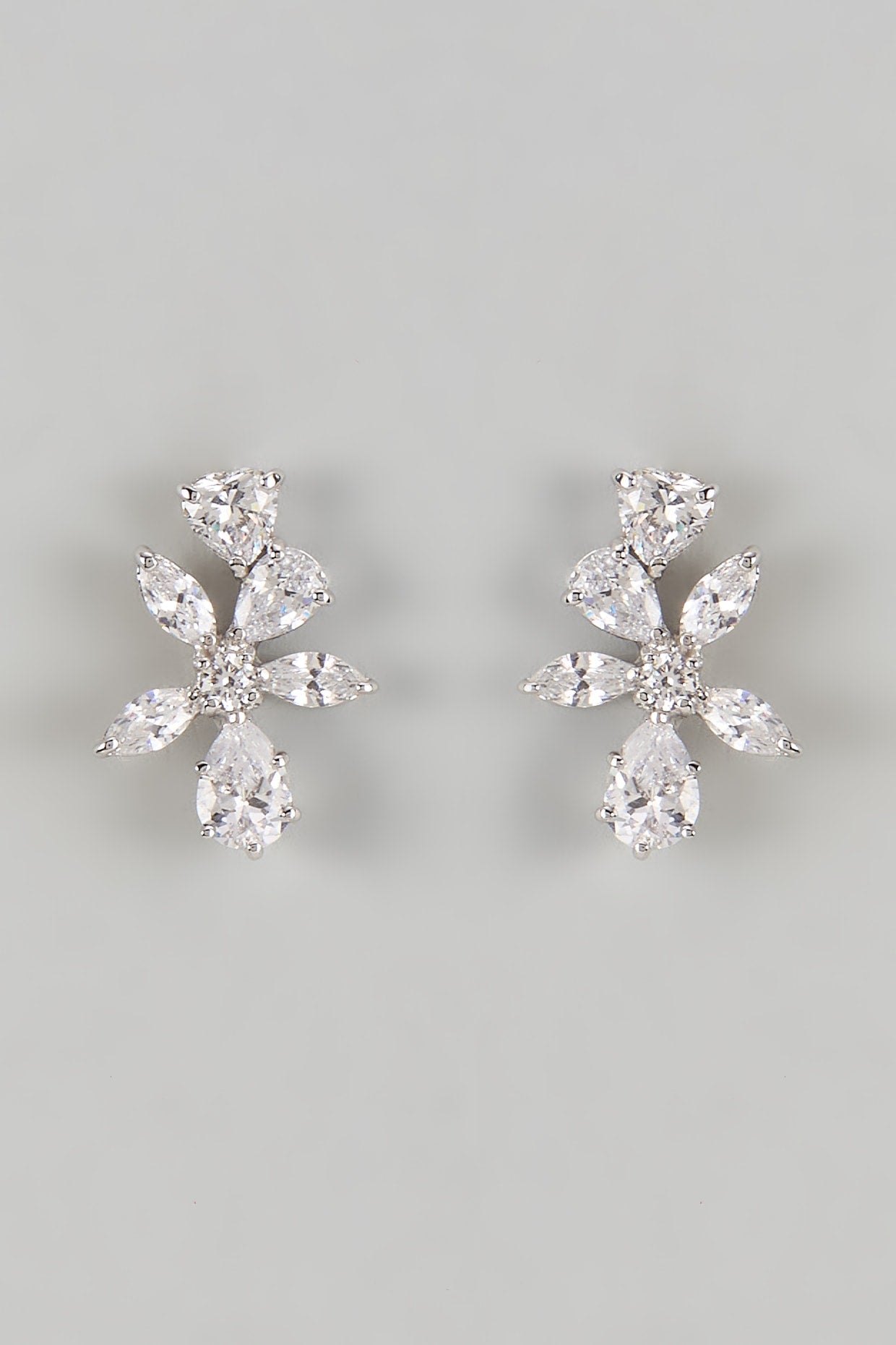 White Finish Zircon Stud Earrings In Sterling Silver