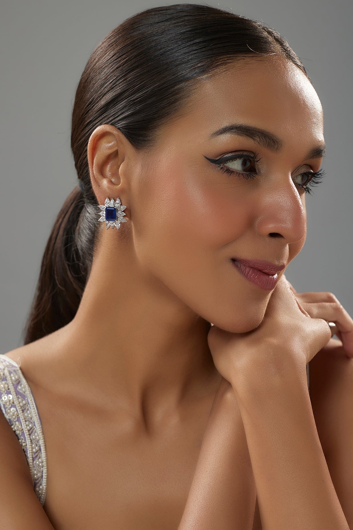 White Finish Halo Diamond & Blue Sapphire Stone Stud Earrings In Sterling Silver