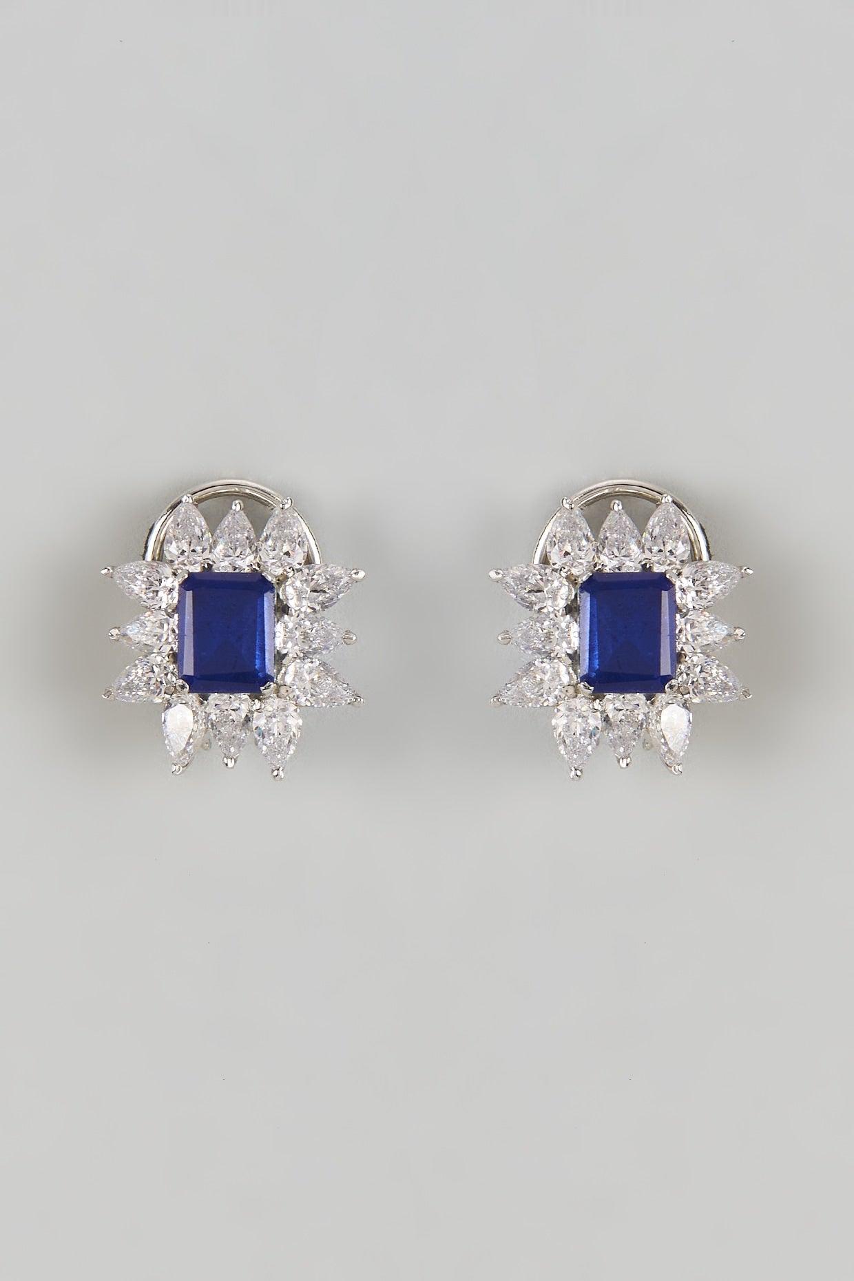 White Finish Halo Diamond & Blue Sapphire Stone Stud Earrings In Sterling Silver