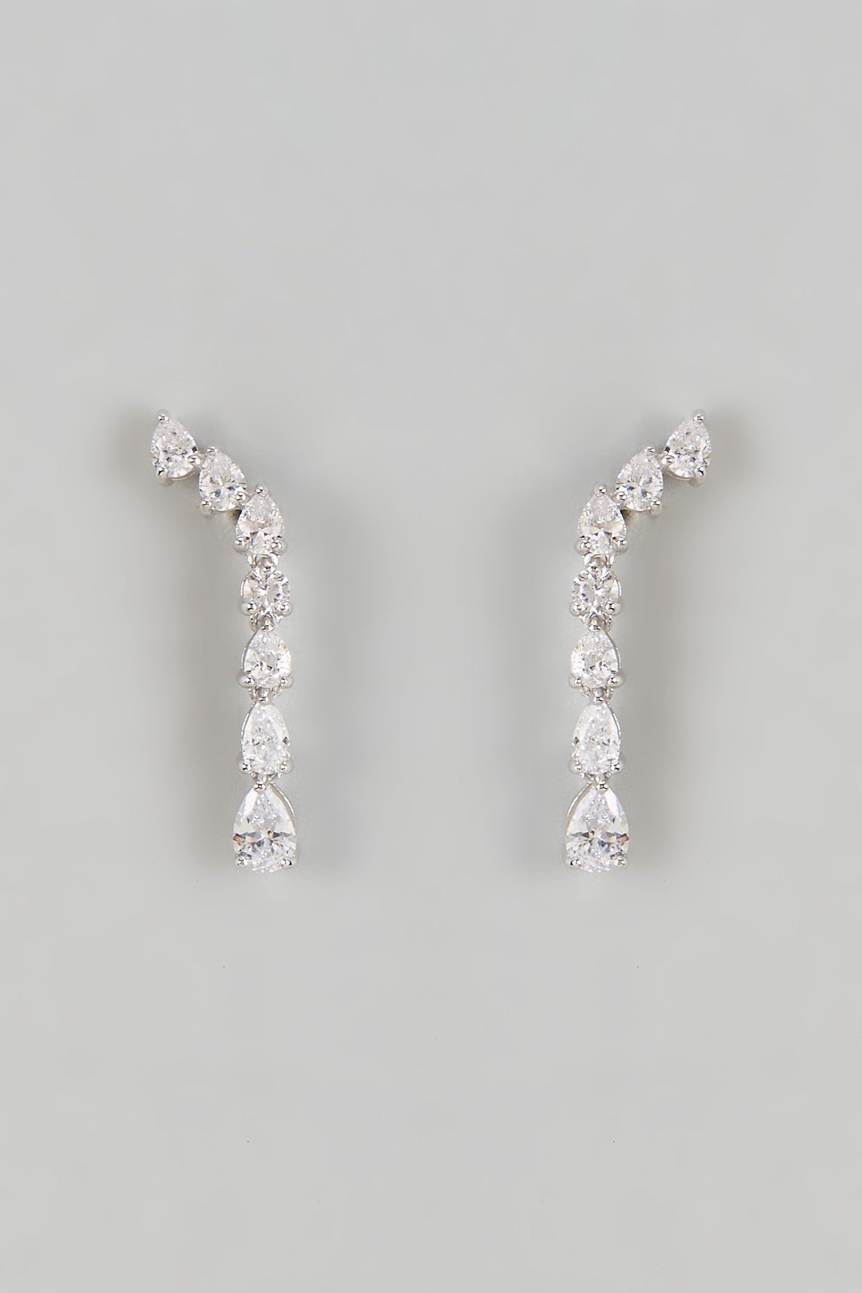 White Finish Zircon Dangler Earrings In Sterling Silver