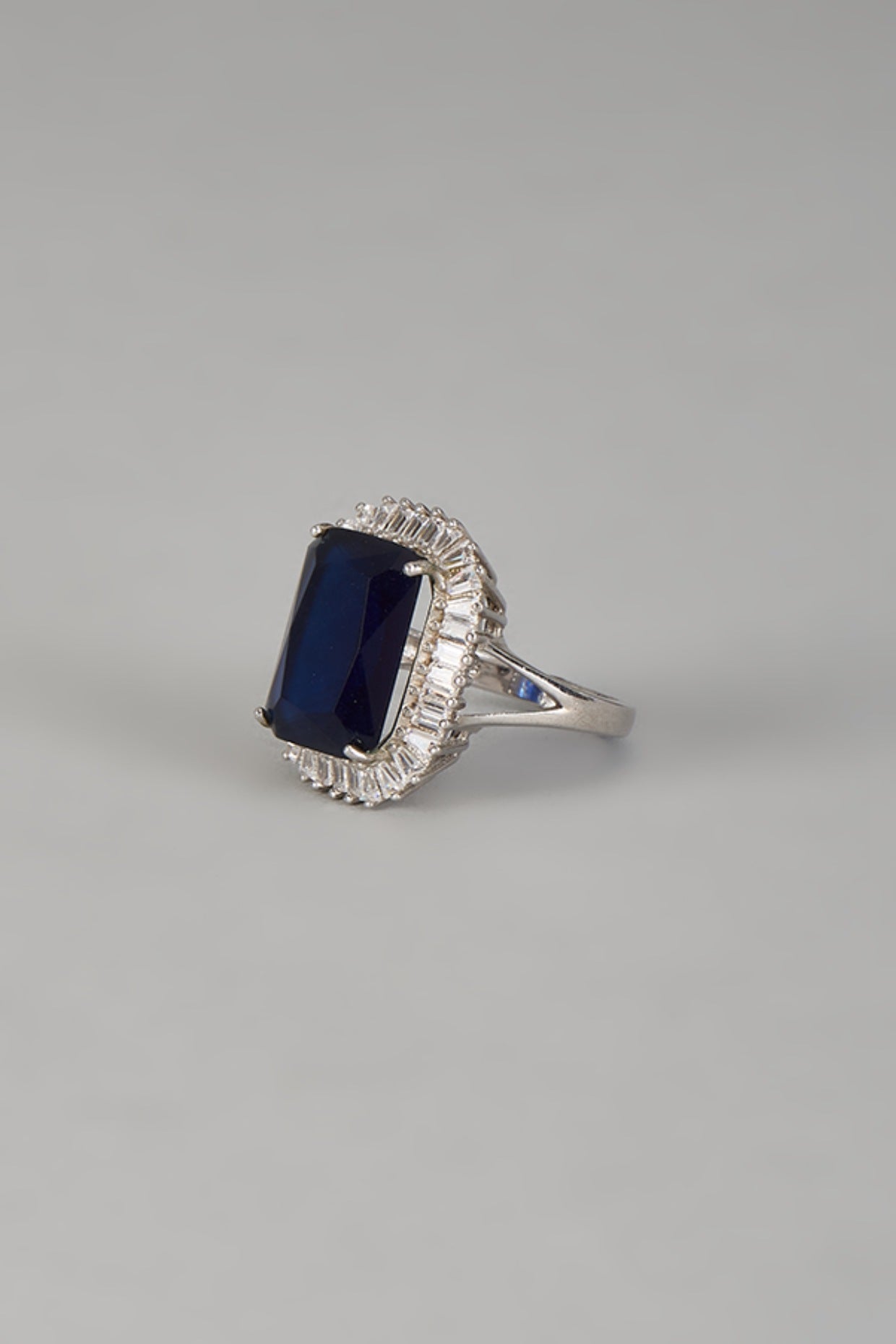 White Finish Halo Diamond & Blue Sapphire Stone Ring In Sterling Silver