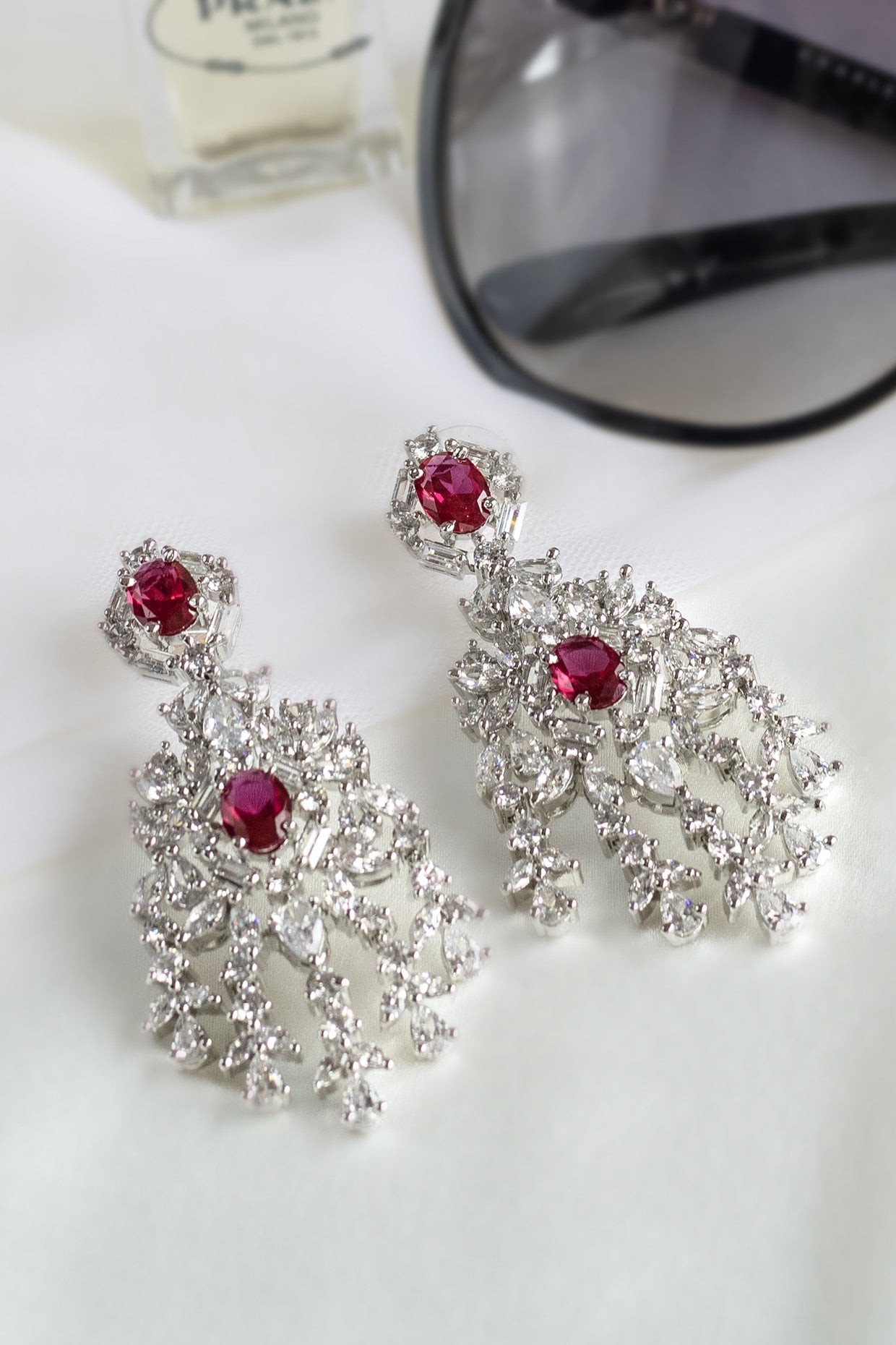 White Finish Ruby Dangler Earrings