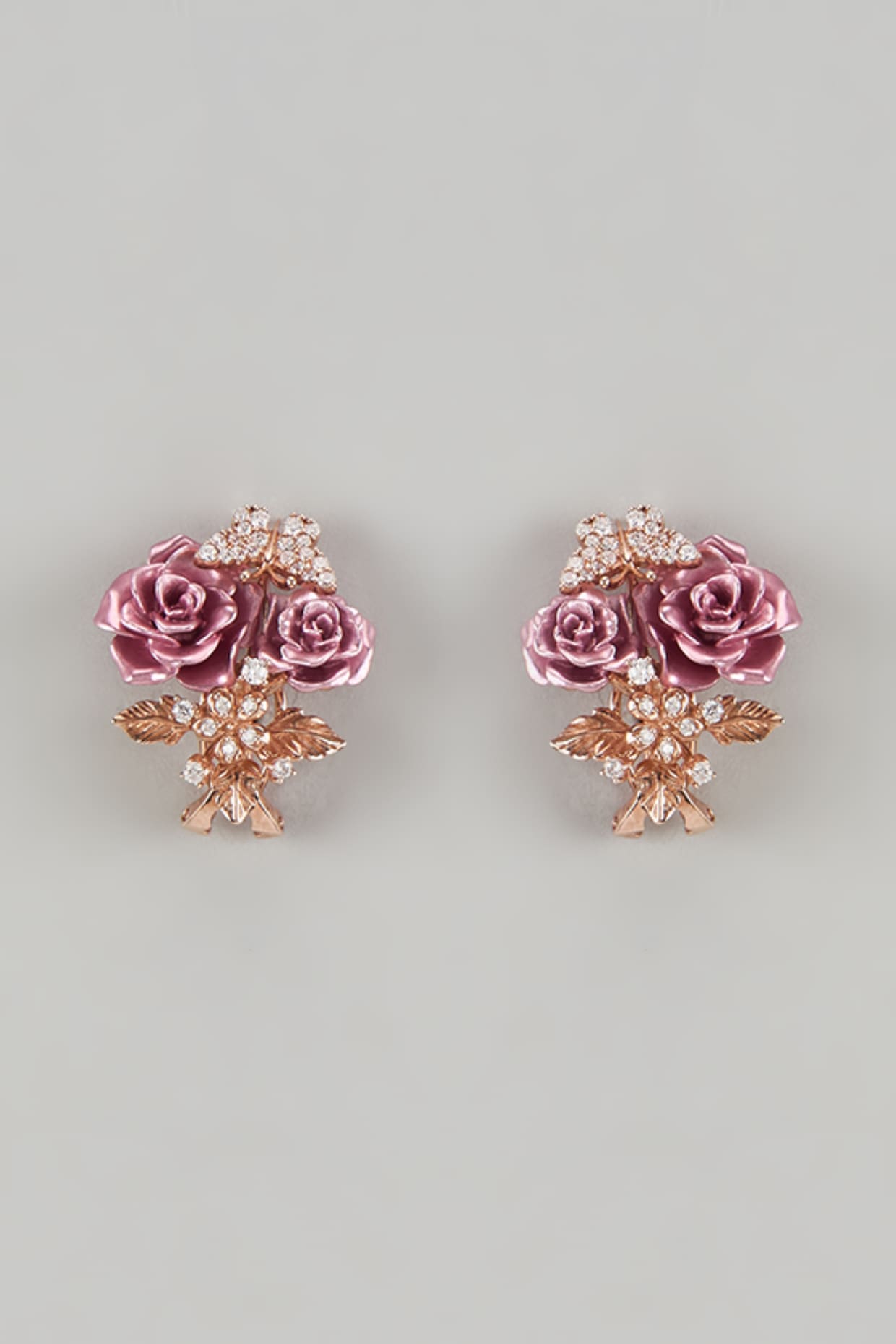 Rose Gold Finish Cubic Zirconia Floral Stud Earrings In Sterling Silver