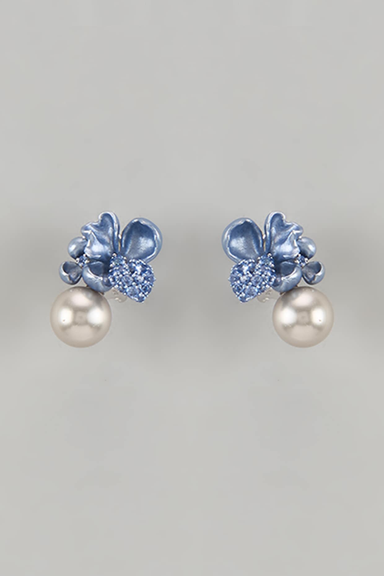 White Finish Cubic Zirconia & Aqua Stone Floral Stud Earrings In Sterling Silver