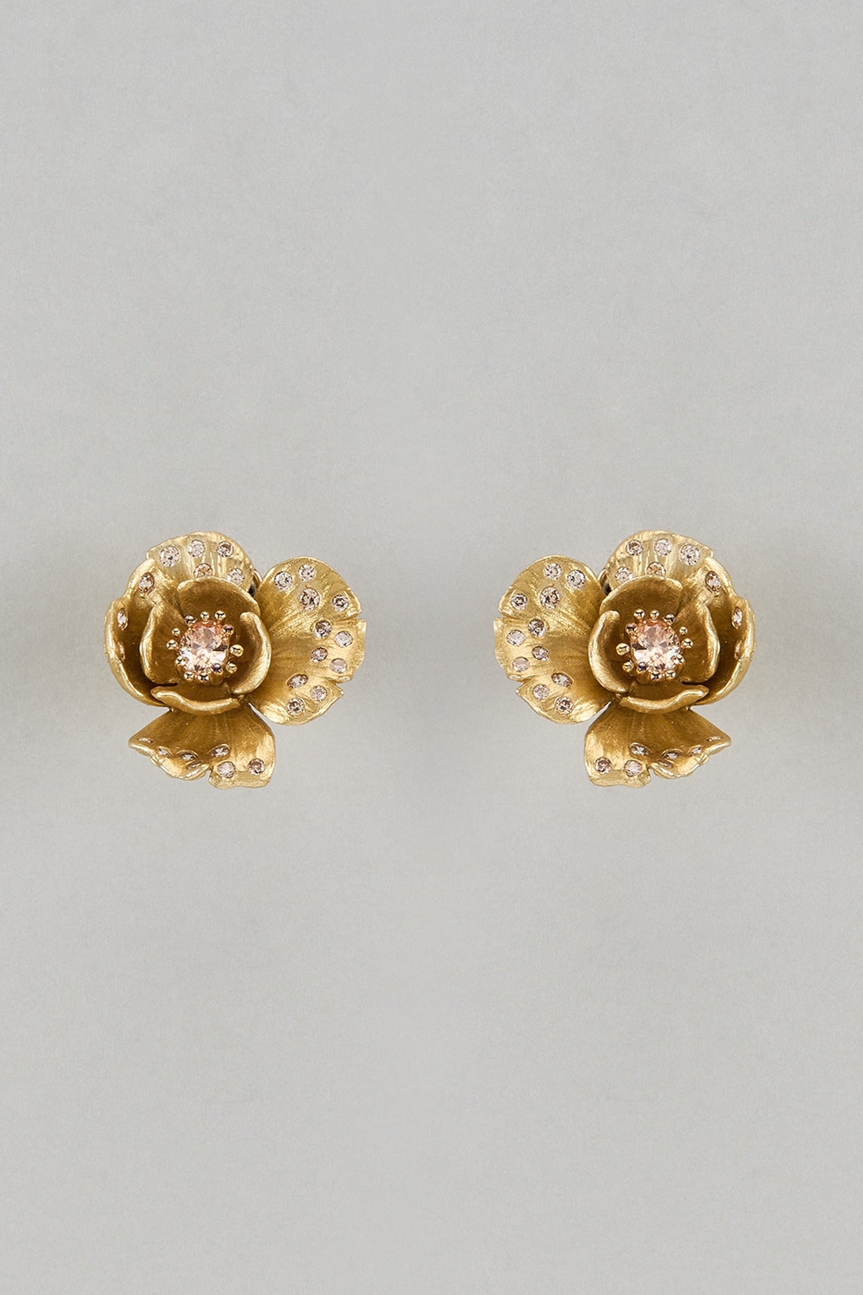 Gold Finish Cubic Zirconia Floral Stud Earrings In Sterling Silver