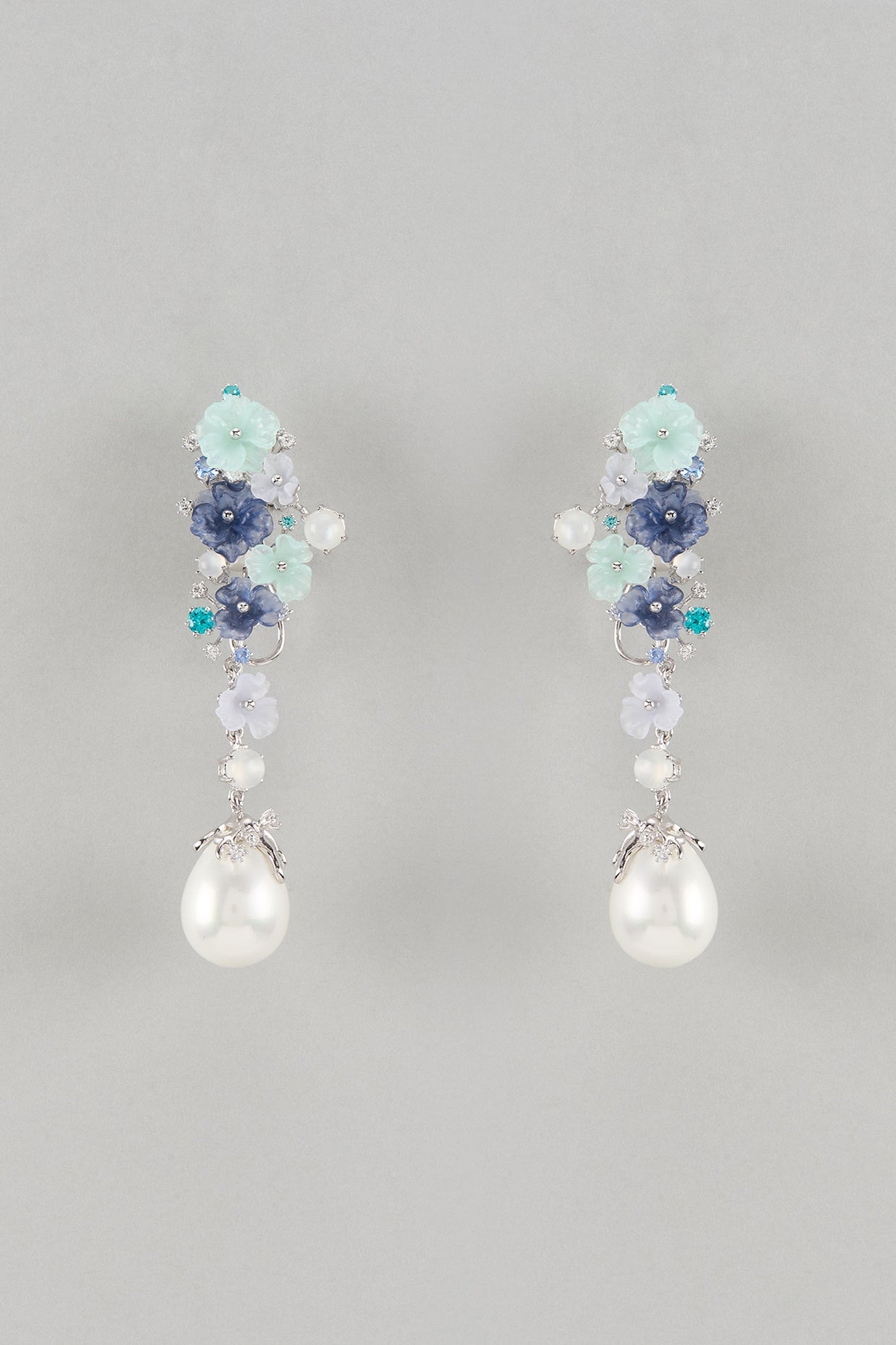 White Finish Cubic Zirconia & Blue Stone Floral Dangler Earrings In Sterling Silver