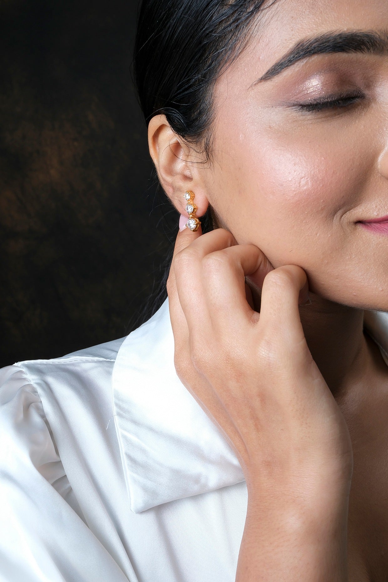 Gold Plated Zircon Dangler Earrings In Sterling Silver